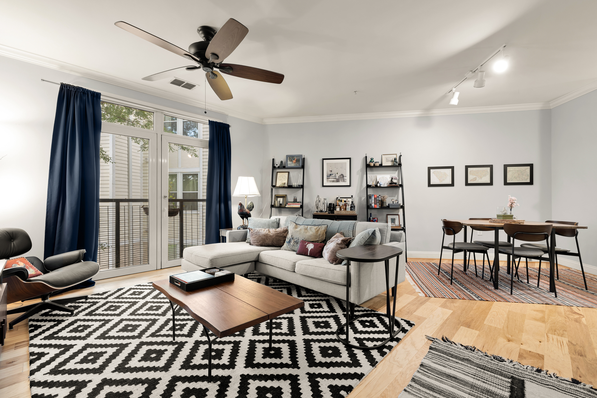 1391 Pennsylvania Ave. Southeast, Unit 324 Washington, DC 20003 - Photo 12 of 33 a living room with furniture rug and window