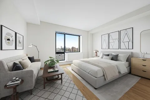 a spacious bedroom with a bed and windows