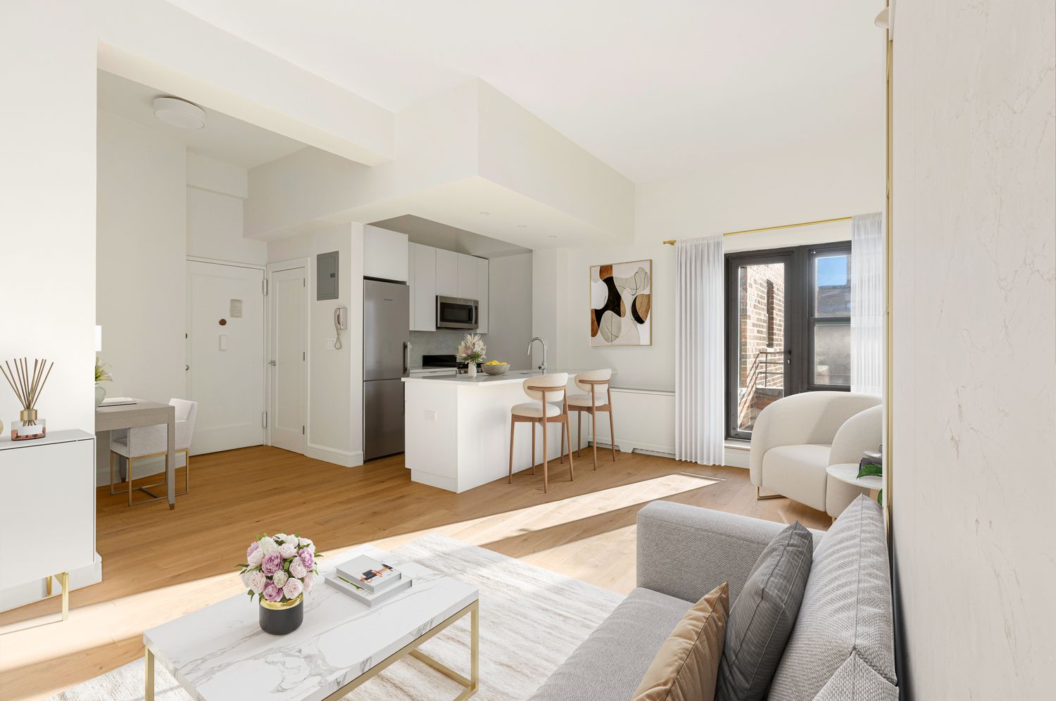 11 Riverside Drive, Unit 17E Manhattan, NY 10023 - Photo 1 of 16 a living room with furniture and view of kitchen