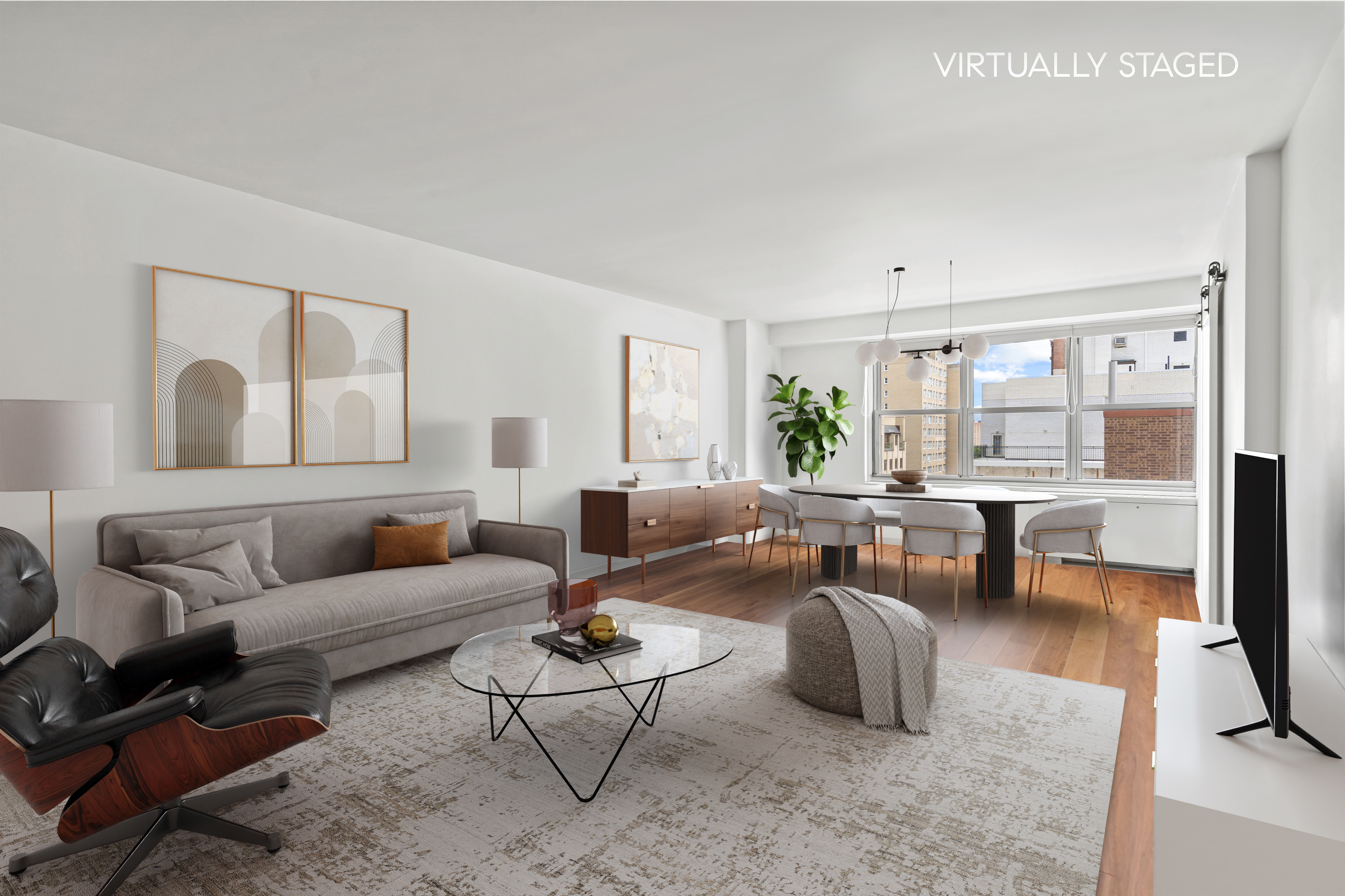 205 3rd Avenue, Unit 11T Manhattan, NY 10003 - Photo 1 of 20 a living room with furniture and a large window
