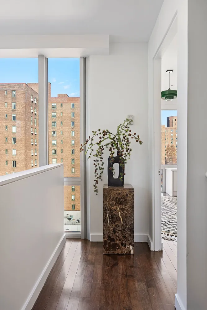 a view of entryway with wooden floor