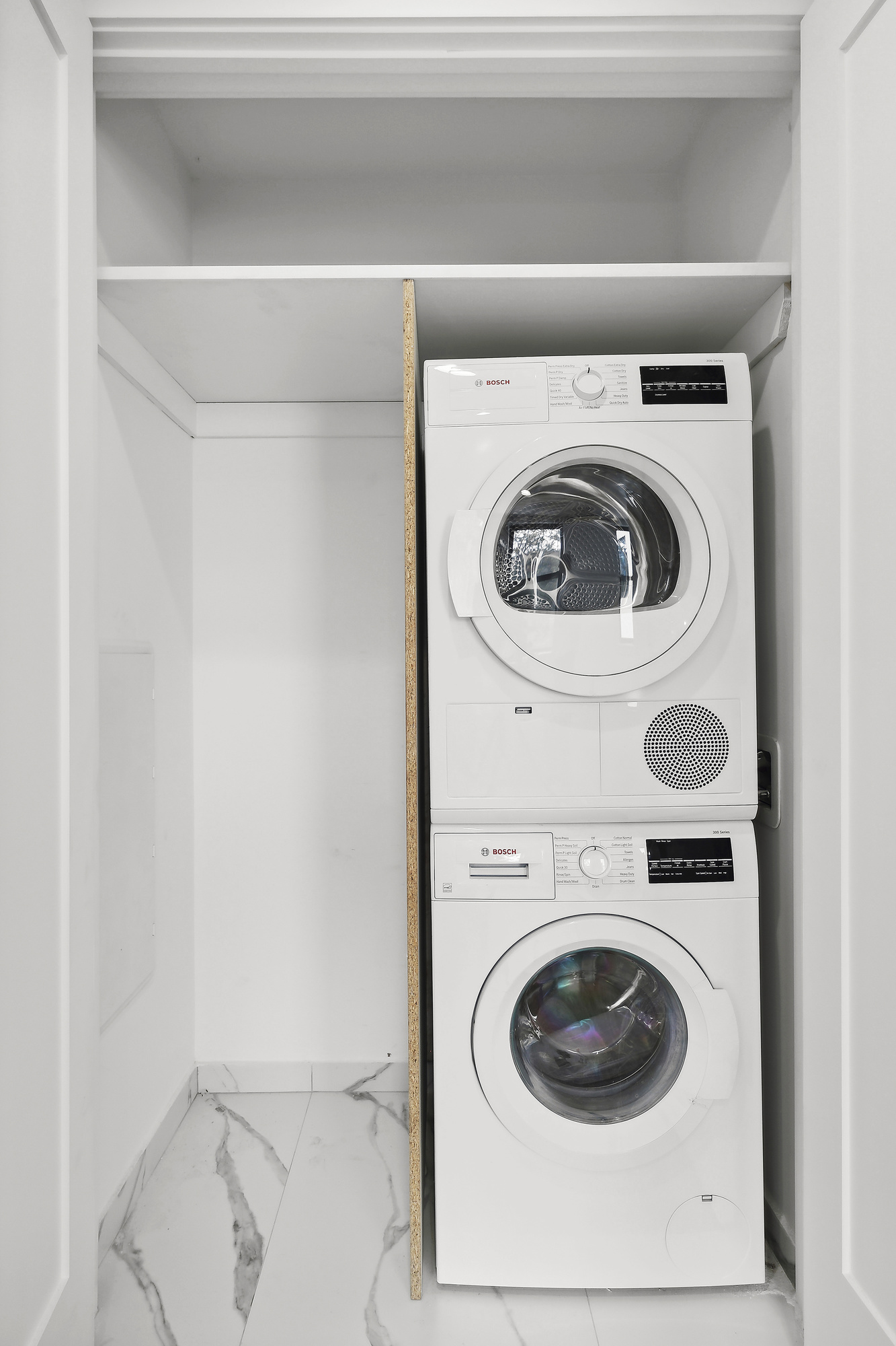 116 Madison Street Brooklyn, NY 11216 - Photo 12 of 20 a utility room with dryer and washer