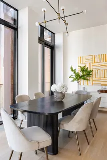 a view of a dining room with furniture