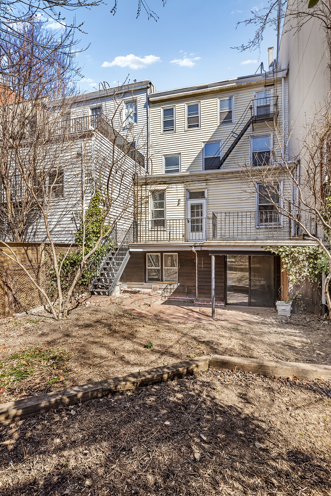 44 Butler Street Brooklyn, NY 11231 - Photo 19 of 22 front view of a house with a large tree