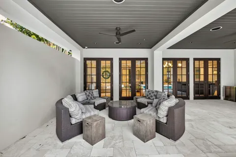 a living room with furniture and window