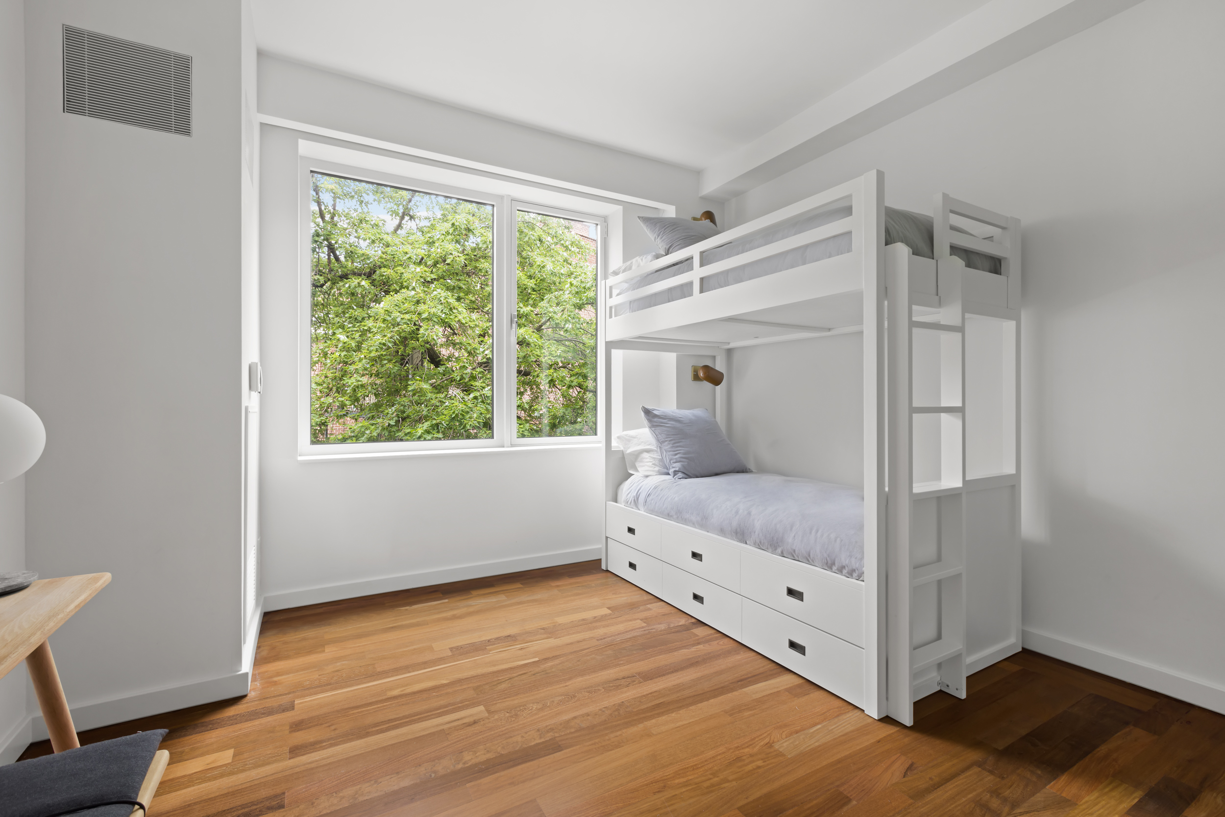 744 Greenwich Street, Unit 4 Manhattan, NY 10014 - Photo 30 of 34 a room that has a bed and a window