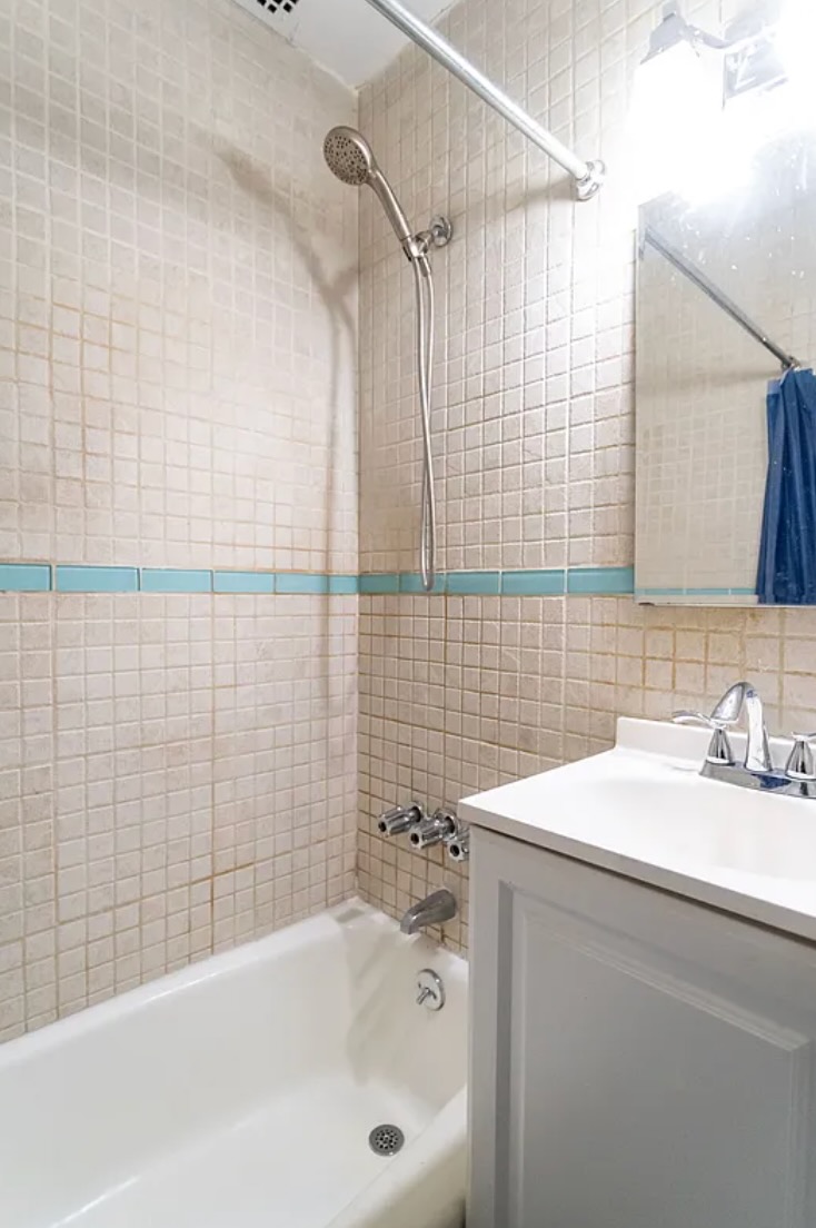 430 East 87th Street, Unit 2A Manhattan, NY 10128 - Photo 8 of 8 a bathroom with a sink and a bathtub