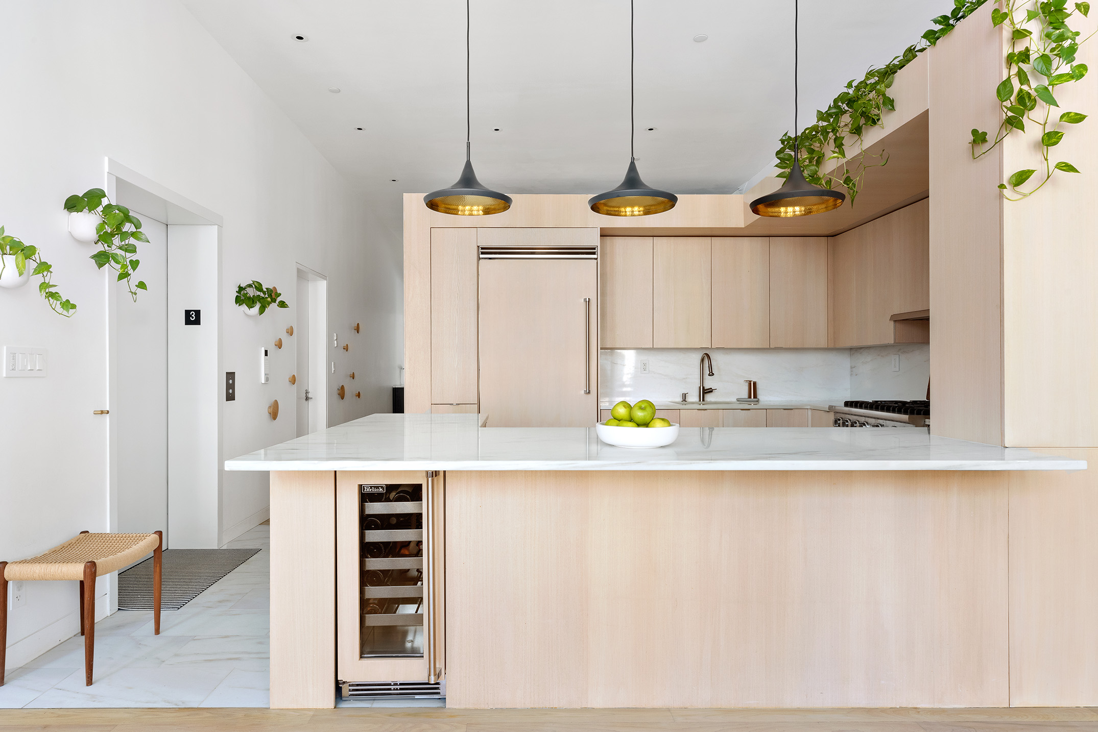 93 Reade Street, Unit 3 Manhattan, NY 10013 - Photo 3 of 12 a kitchen with a sink a counter appliances and cabinets