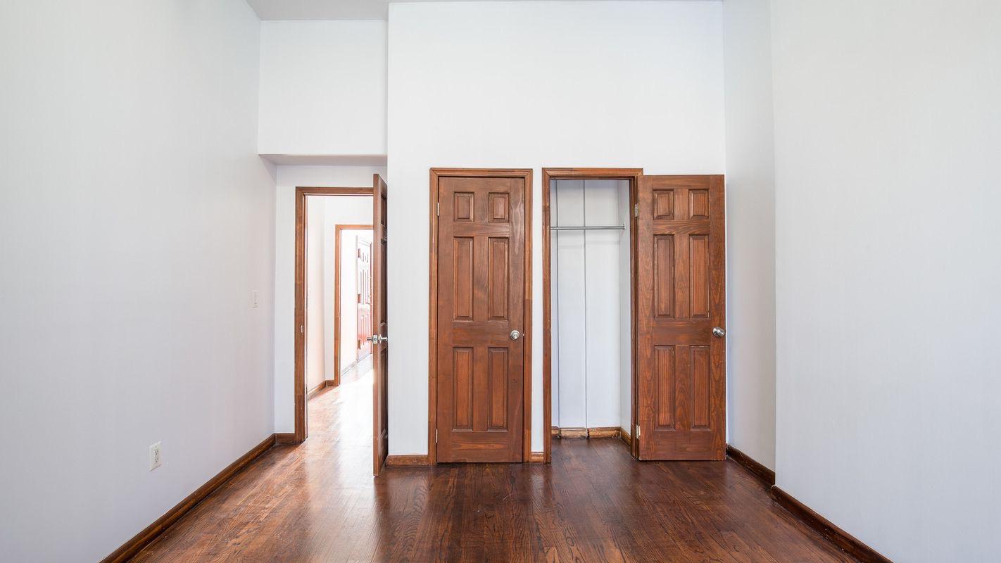 27 Brevoort Place, Unit 2 Brooklyn, NY 11216 - Photo 7 of 9 an empty room with wooden floor and closet