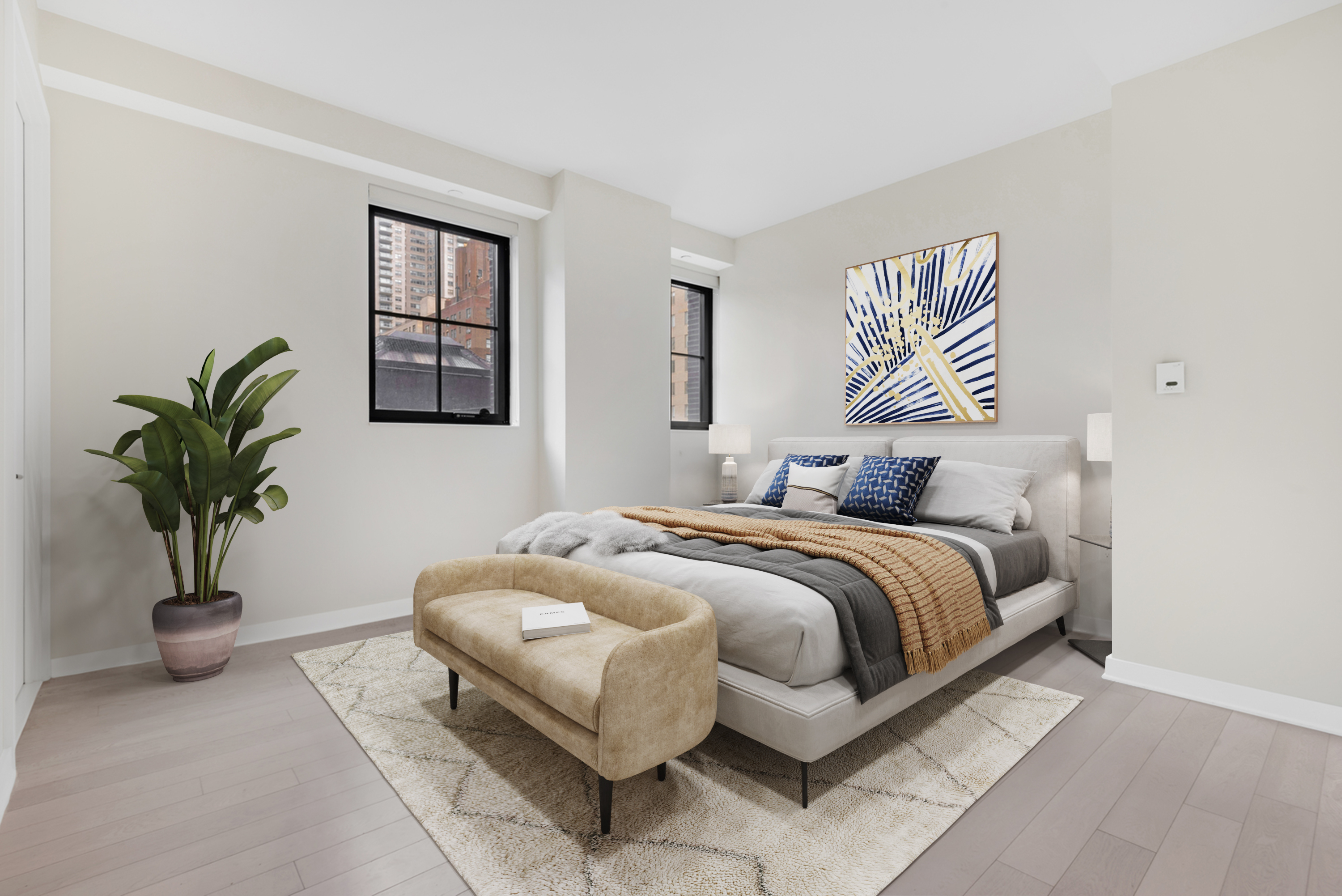 959 1st Avenue, Unit 6P Manhattan, NY 10022 - Photo 8 of 12 a bedroom with a bed and a potted plant