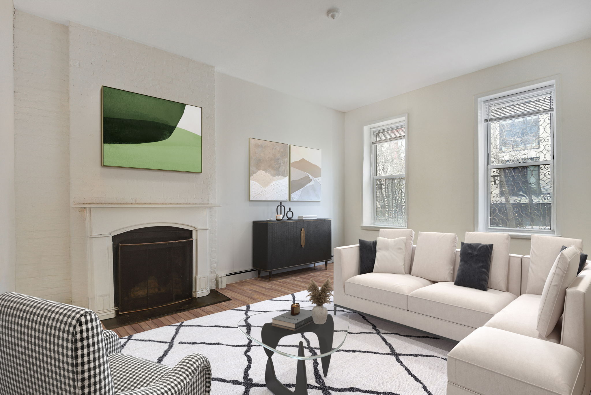 217 West 15th Street Manhattan, NY 10011 - Photo 13 of 21 a living room with furniture a flat screen tv and a fireplace