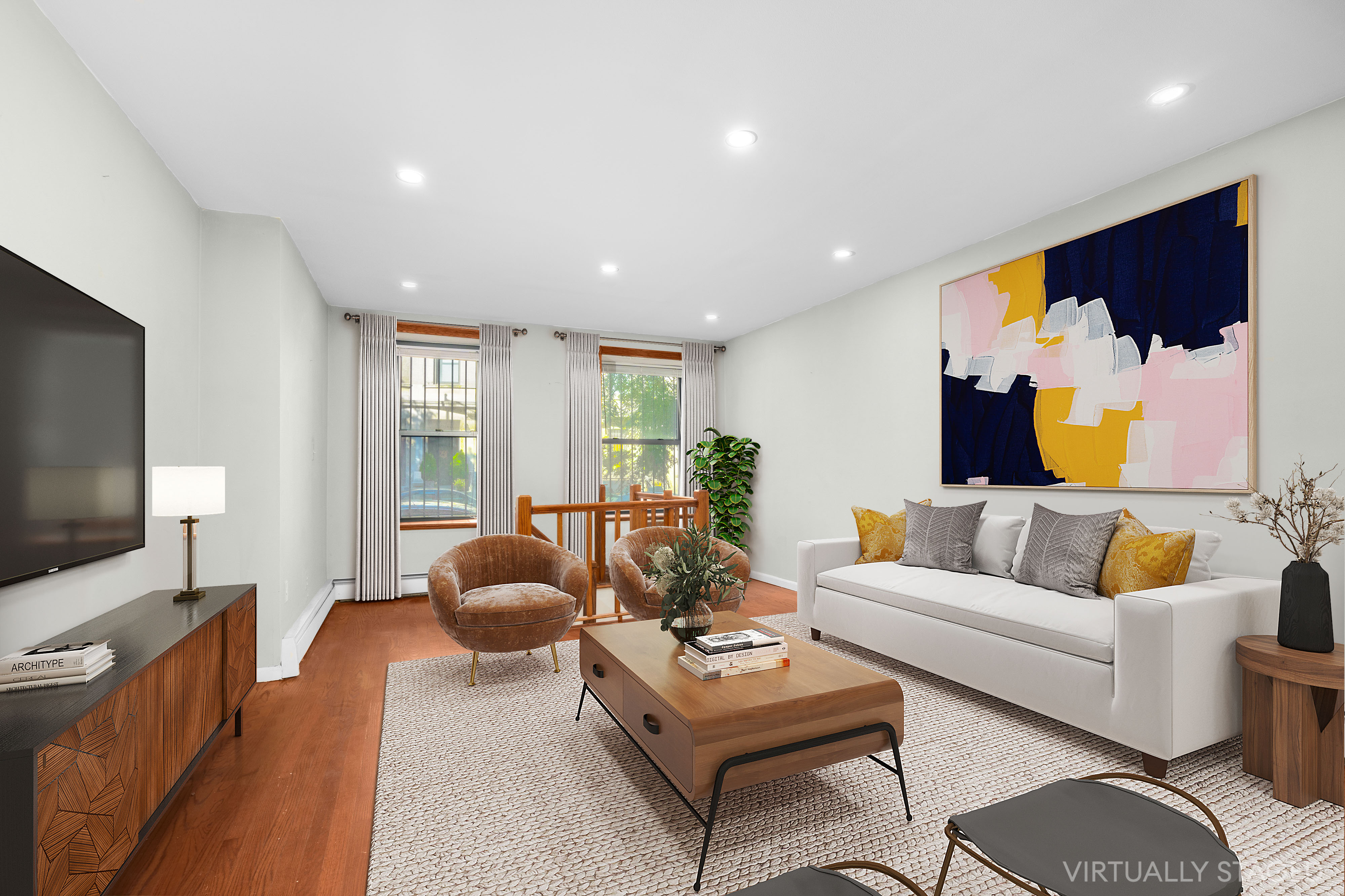 252 West 102nd Street, Unit 1 Manhattan, NY 10025 - Photo 3 of 12 a living room with furniture and a flat screen tv