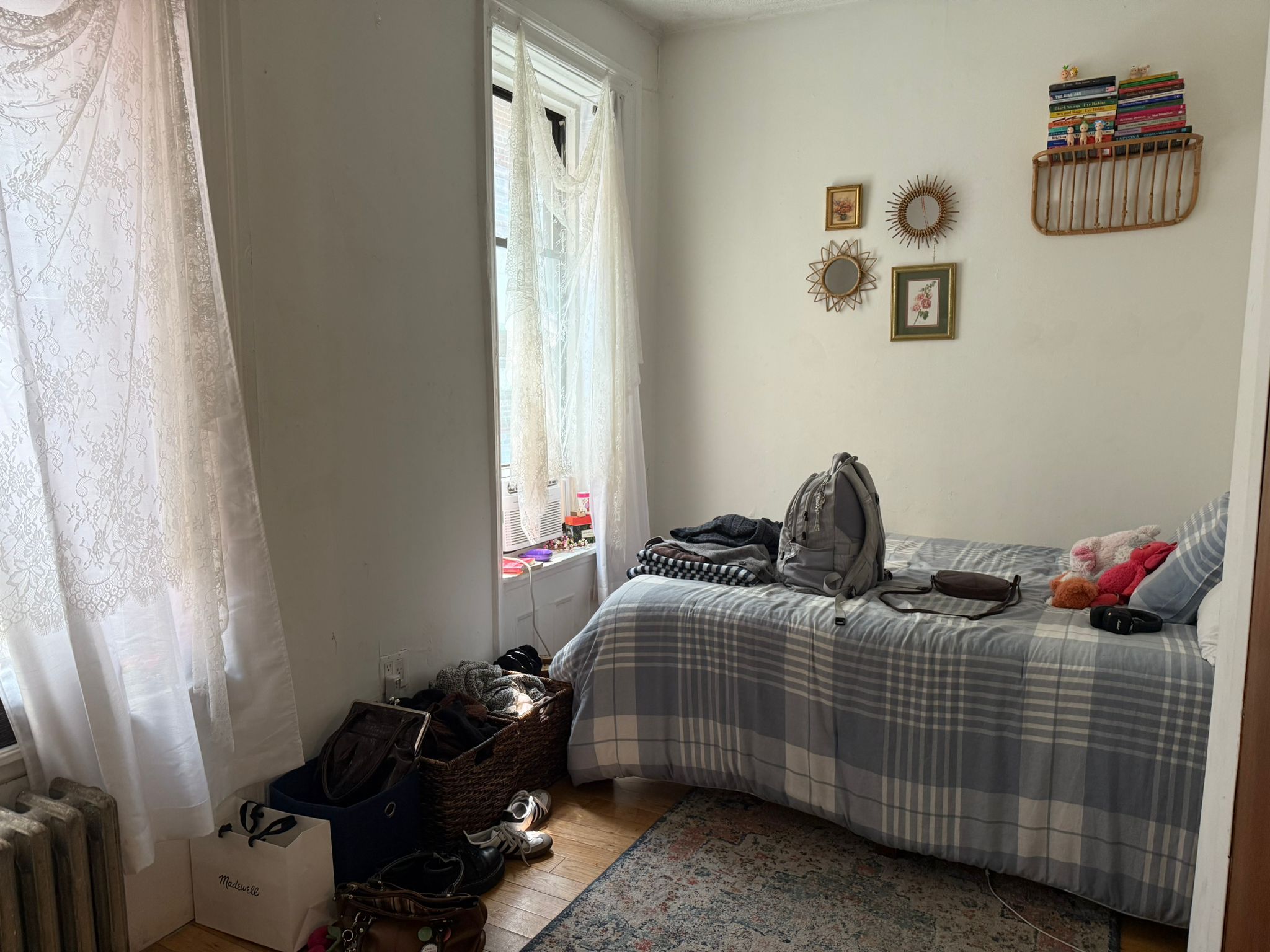 1278 1st Avenue, Unit 2 Manhattan, NY 10065 - Photo 4 of 19 a bedroom with a bed and cabinets