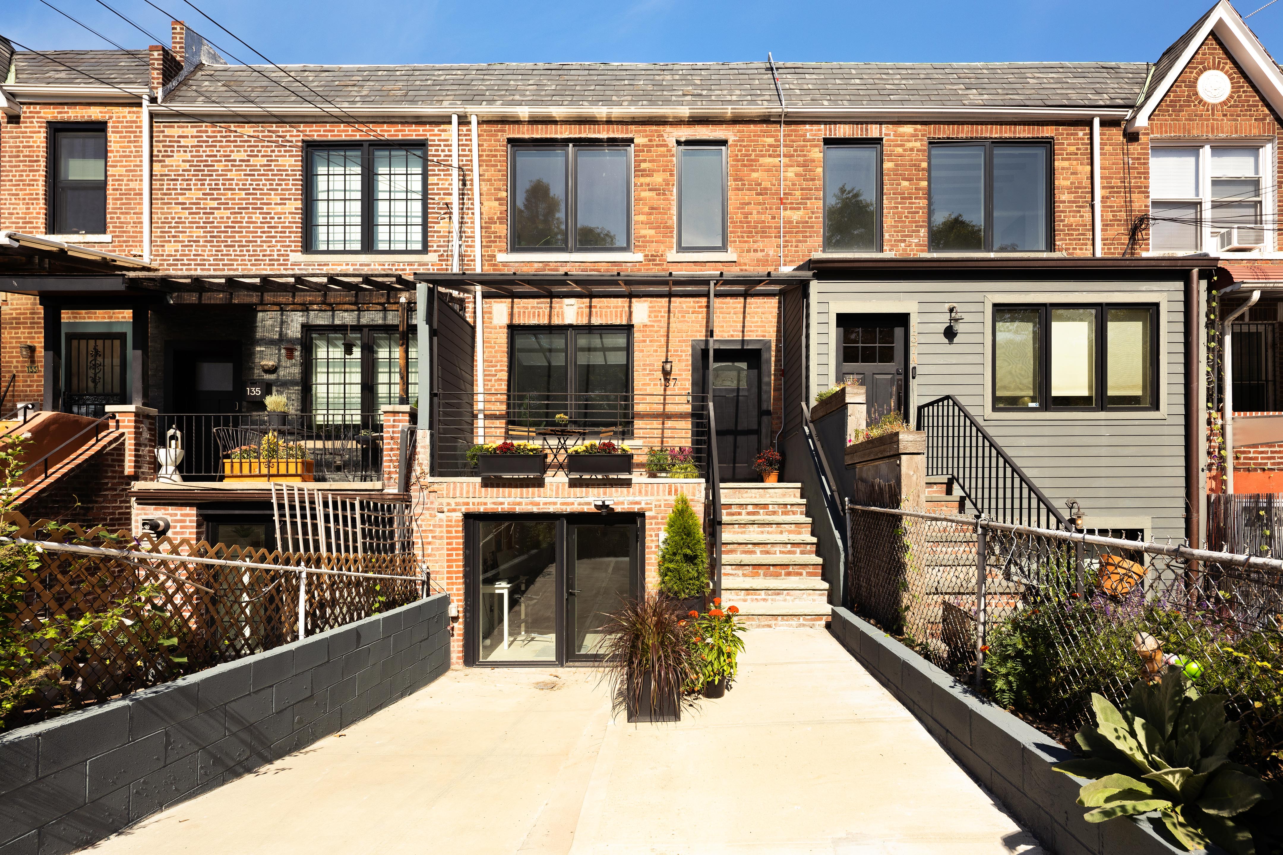 137 Maspeth Avenue Brooklyn, NY 11211 - Photo 2 of 18 a view of a house with glass windows