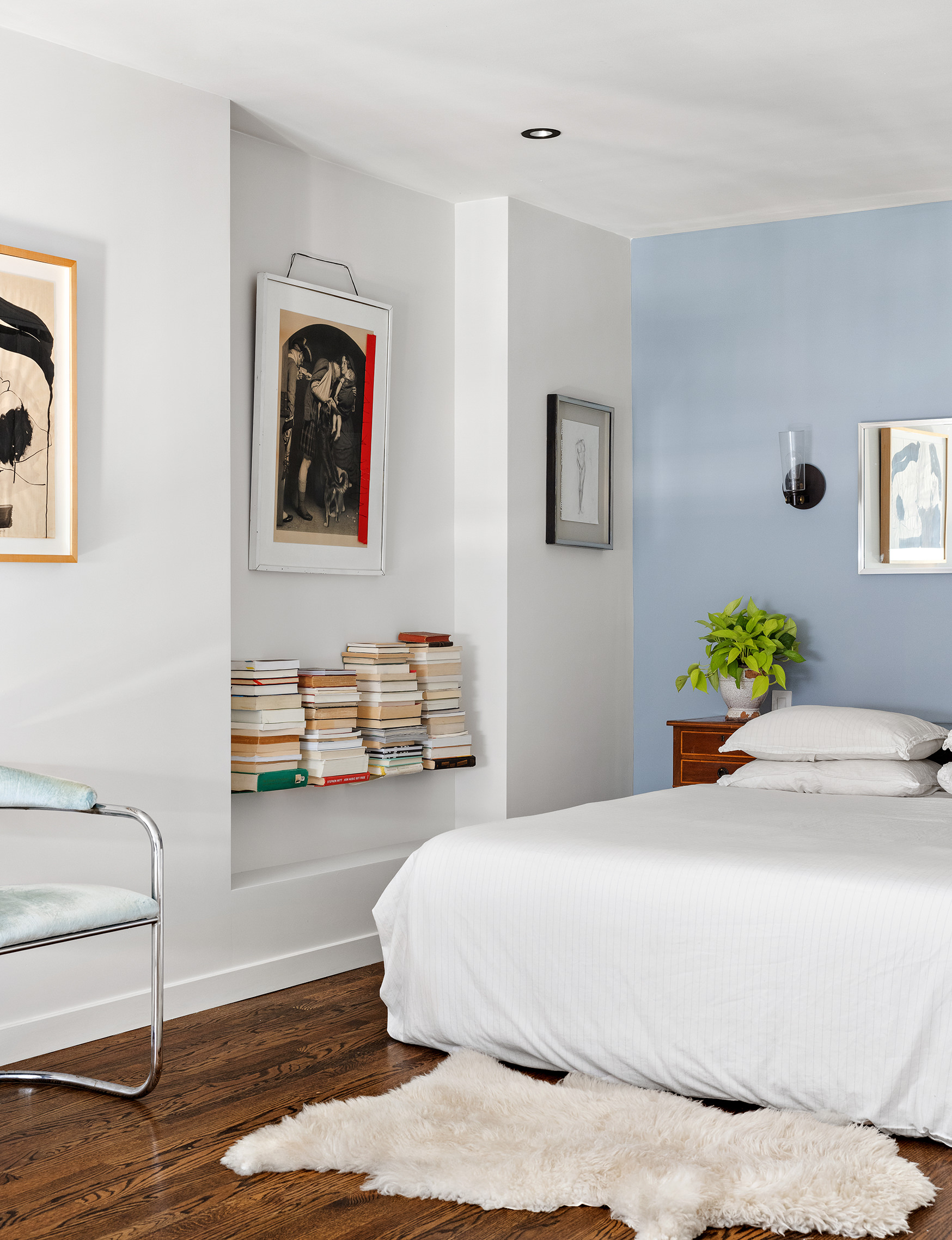 211 Thompson Street, Unit PH6D Manhattan, NY 10012 - Photo 6 of 10 a bedroom with a bed and a couch