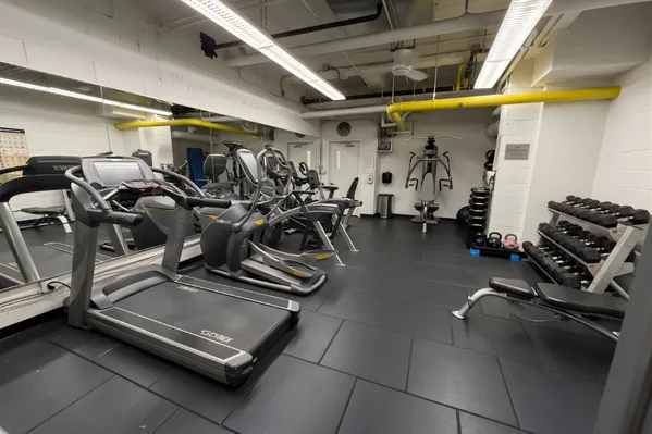 a view of a room with gym equipment