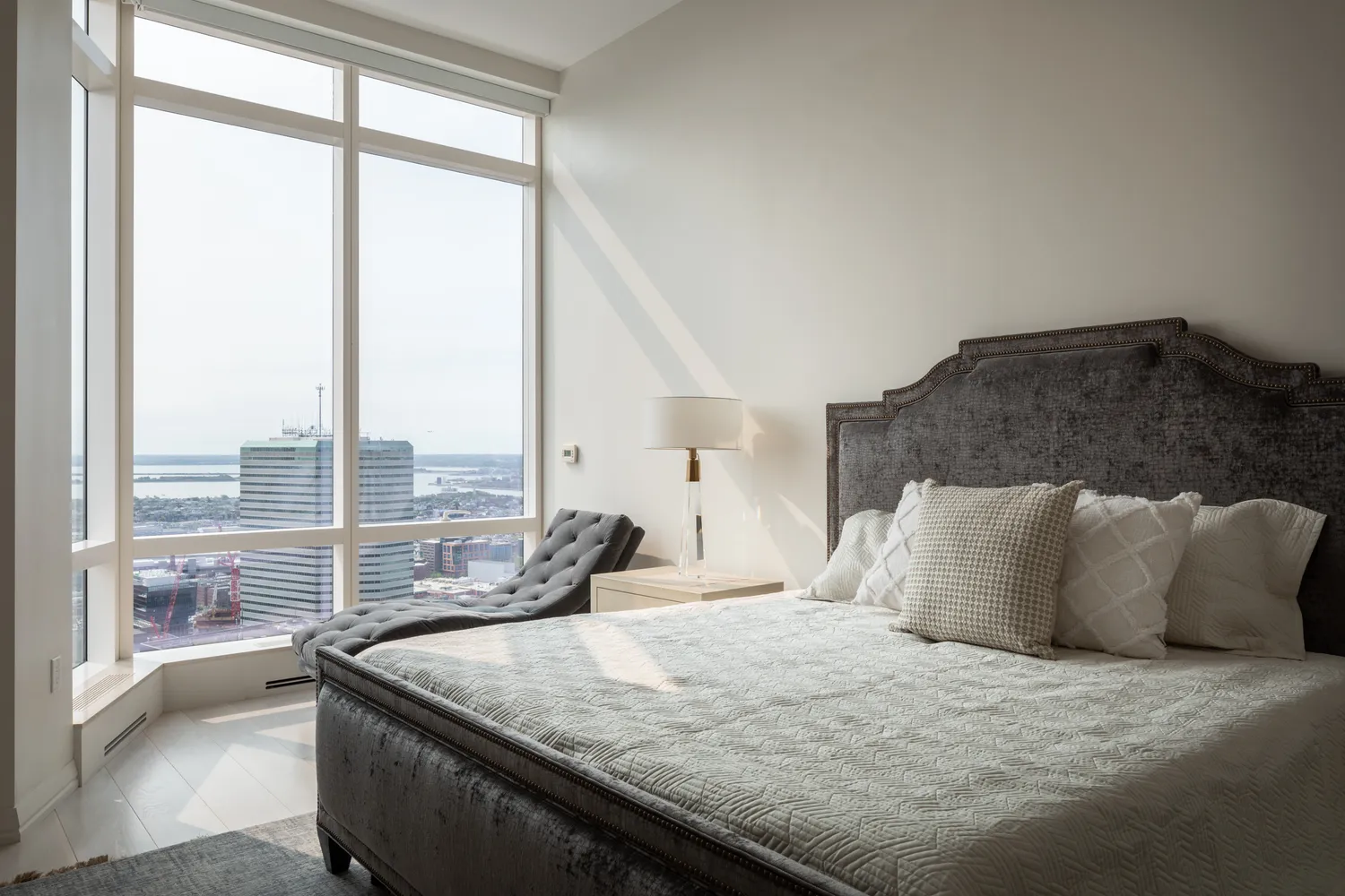 a view of a kitchen with a large window