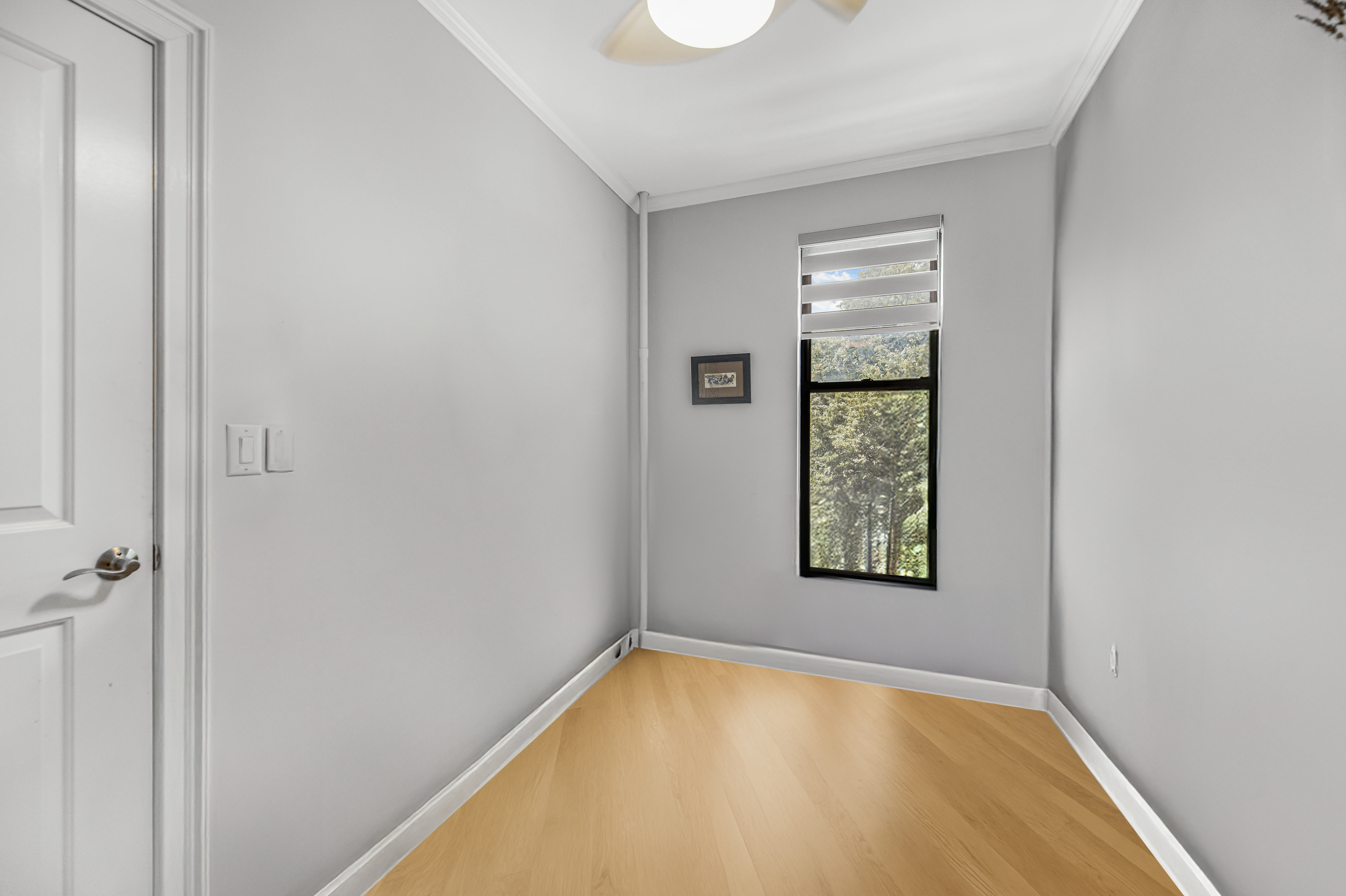 660 Riverside Drive, Unit 4J Manhattan, NY 10031 - Photo 3 of 7 a view of a room that has a window