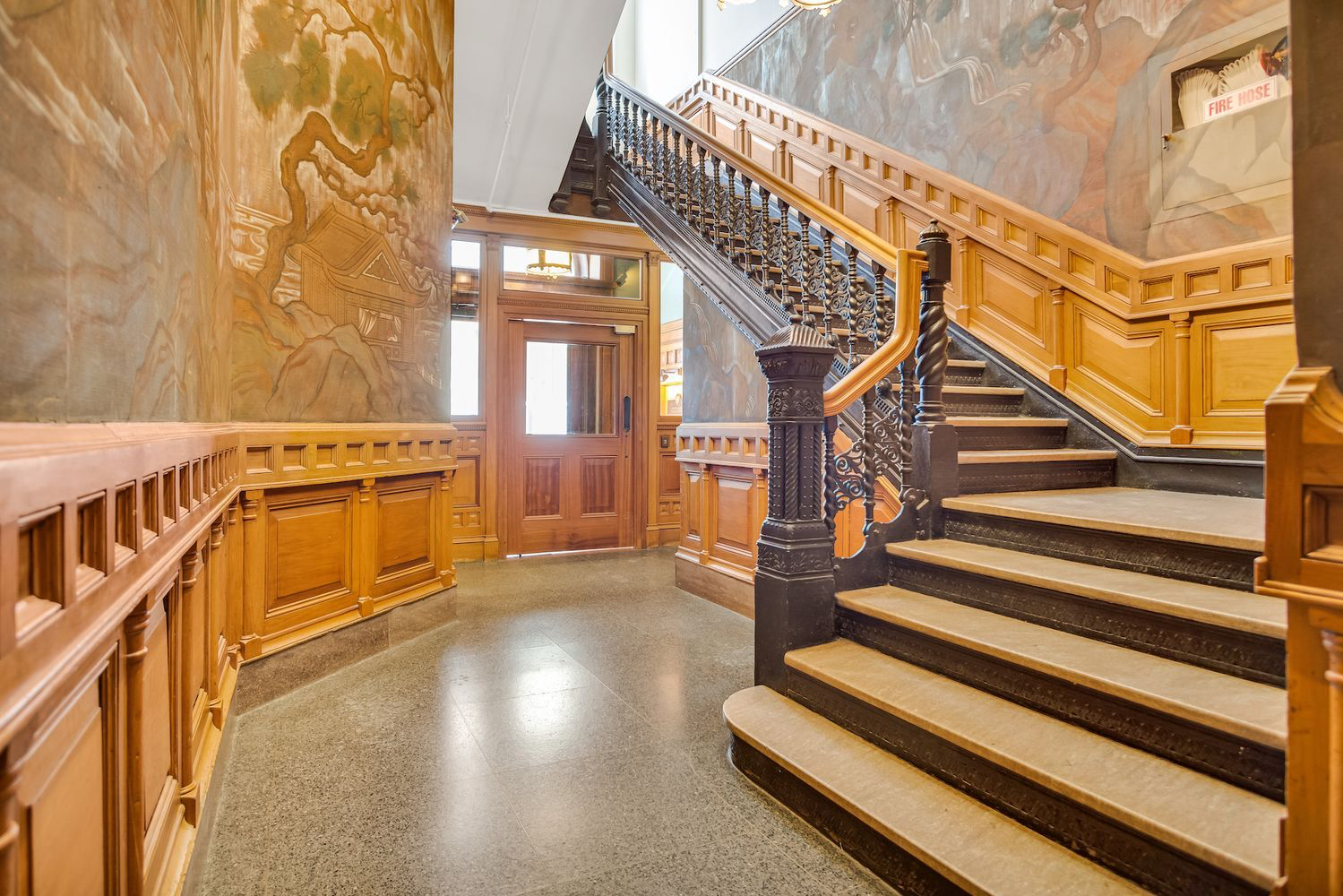 284 5th Avenue, Unit 5F Manhattan, NY 10001 - Photo 12 of 19 a view of a staircase with white walls