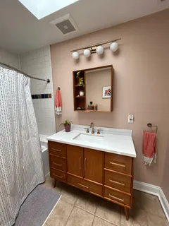 a room with furniture and a book shelf