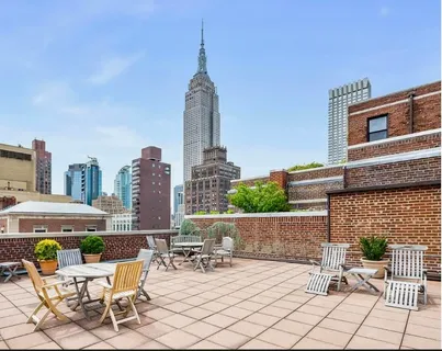 a view of a terrace with chairs