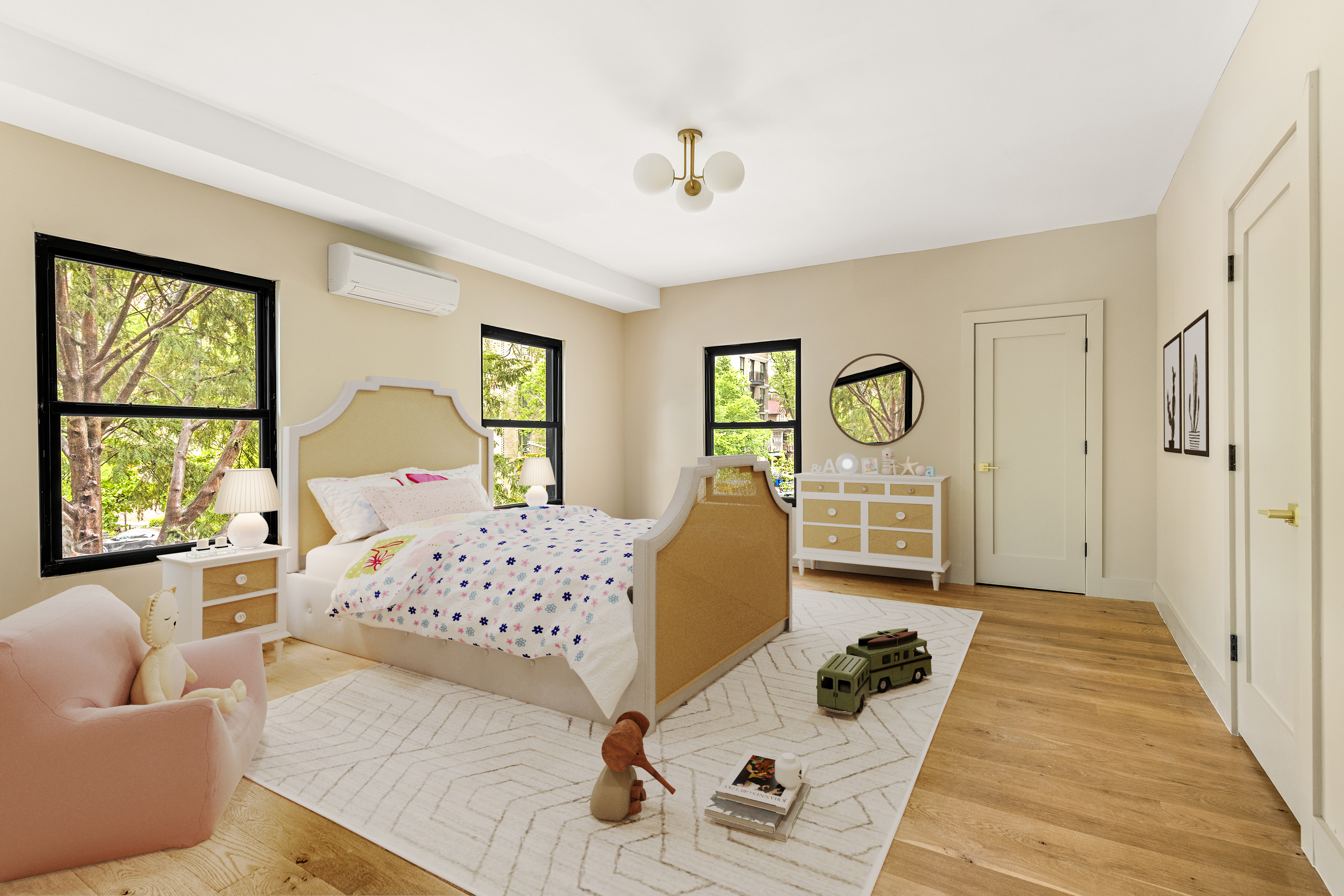 697 East 21st Street Brooklyn, NY 11210 - Photo 16 of 24 a bedroom with a bed couch and a window