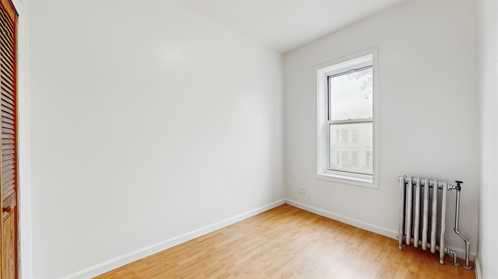 454 77th Street, Unit 3 Brooklyn, NY 11209 - Photo 16 of 25 an empty room with windows