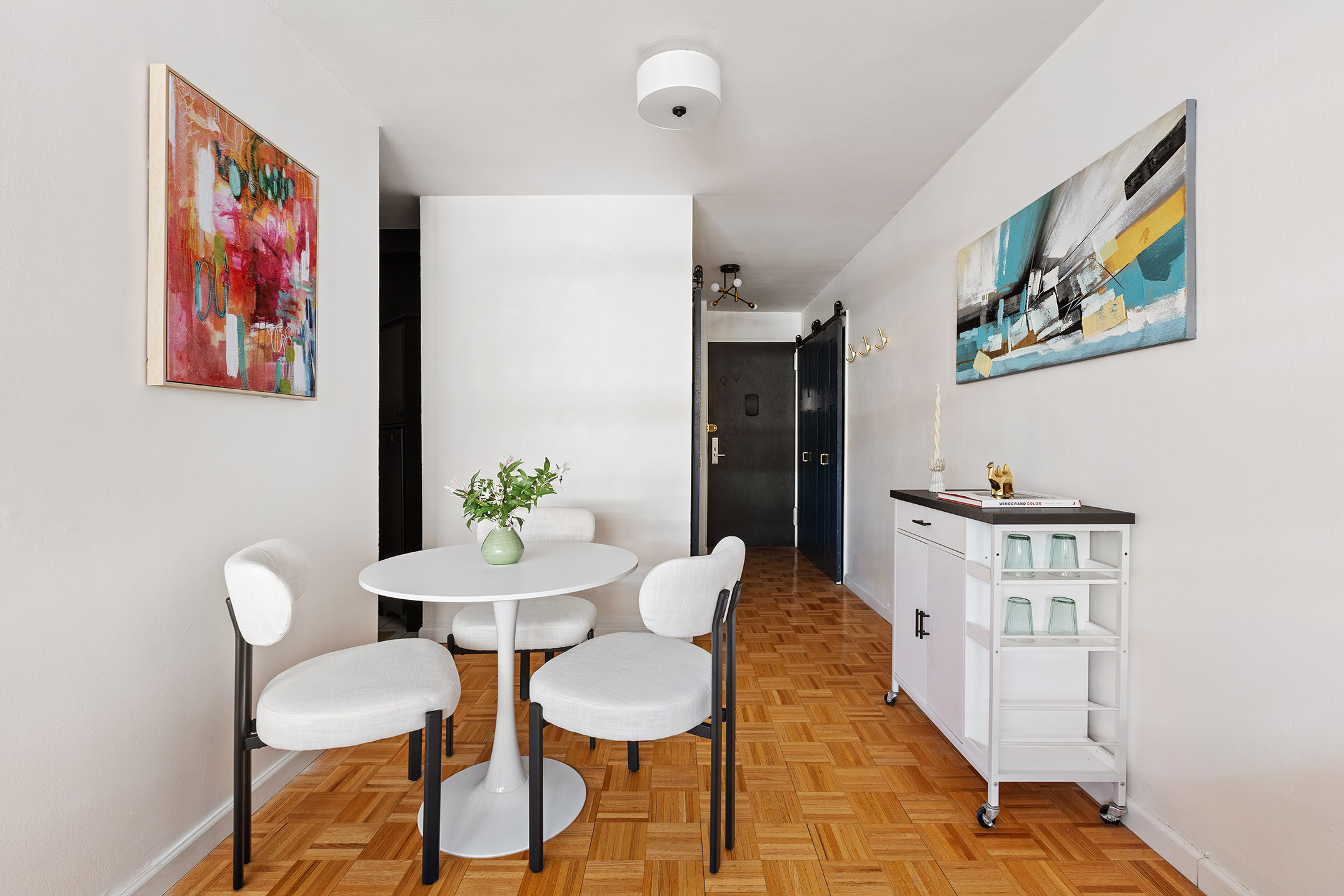 235 East 87th Street, Unit 5G Manhattan, NY 10128 - Photo 3 of 13 a view of a dining room with furniture