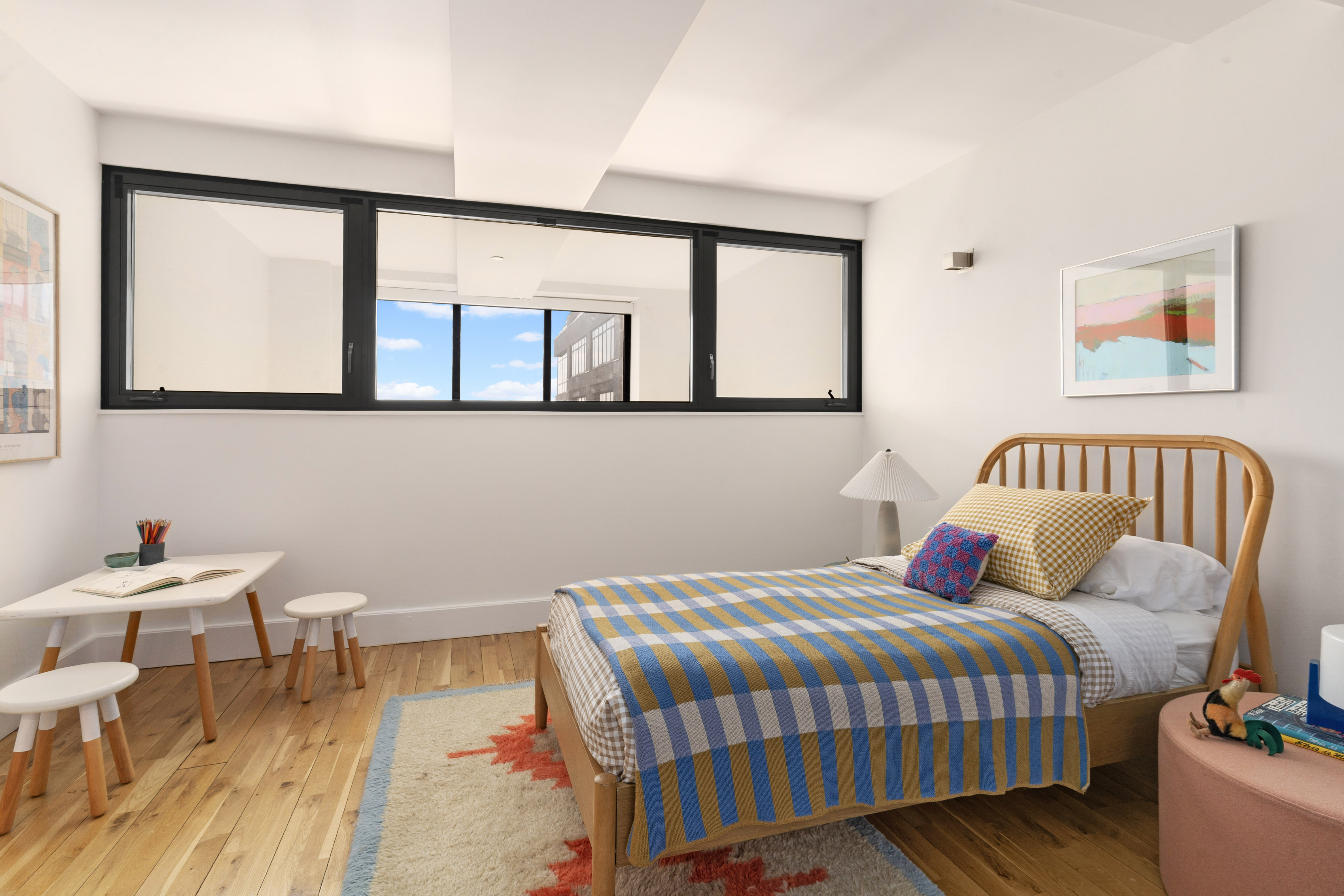 360 Furman Street, Unit 1041/1042 Brooklyn, NY 11201 - Photo 16 of 30 a bedroom with a bed and window