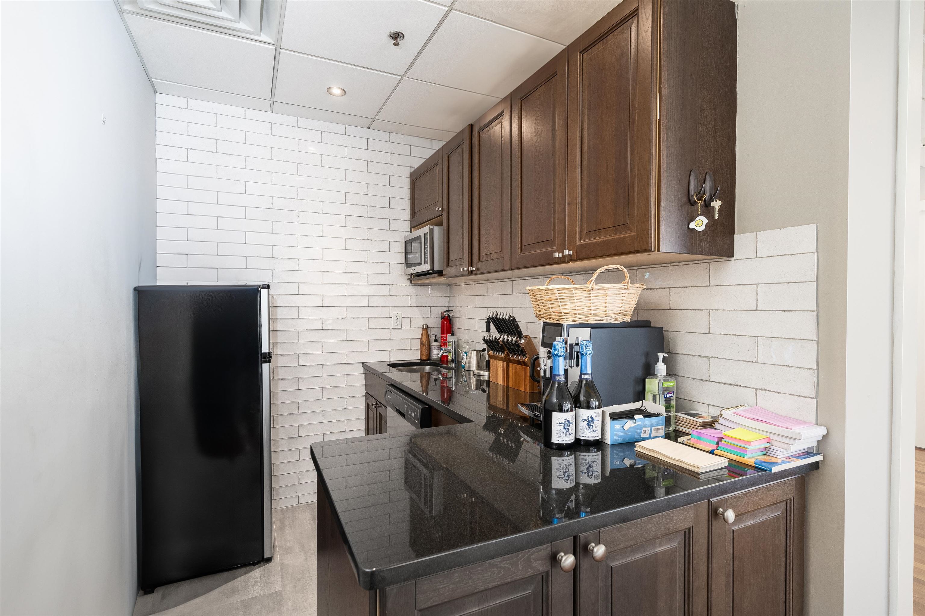 80 River Street, Unit PHNORTH Hoboken, NJ 07030 - Photo 8 of 24 a kitchen with a sink refrigerator and cabinets