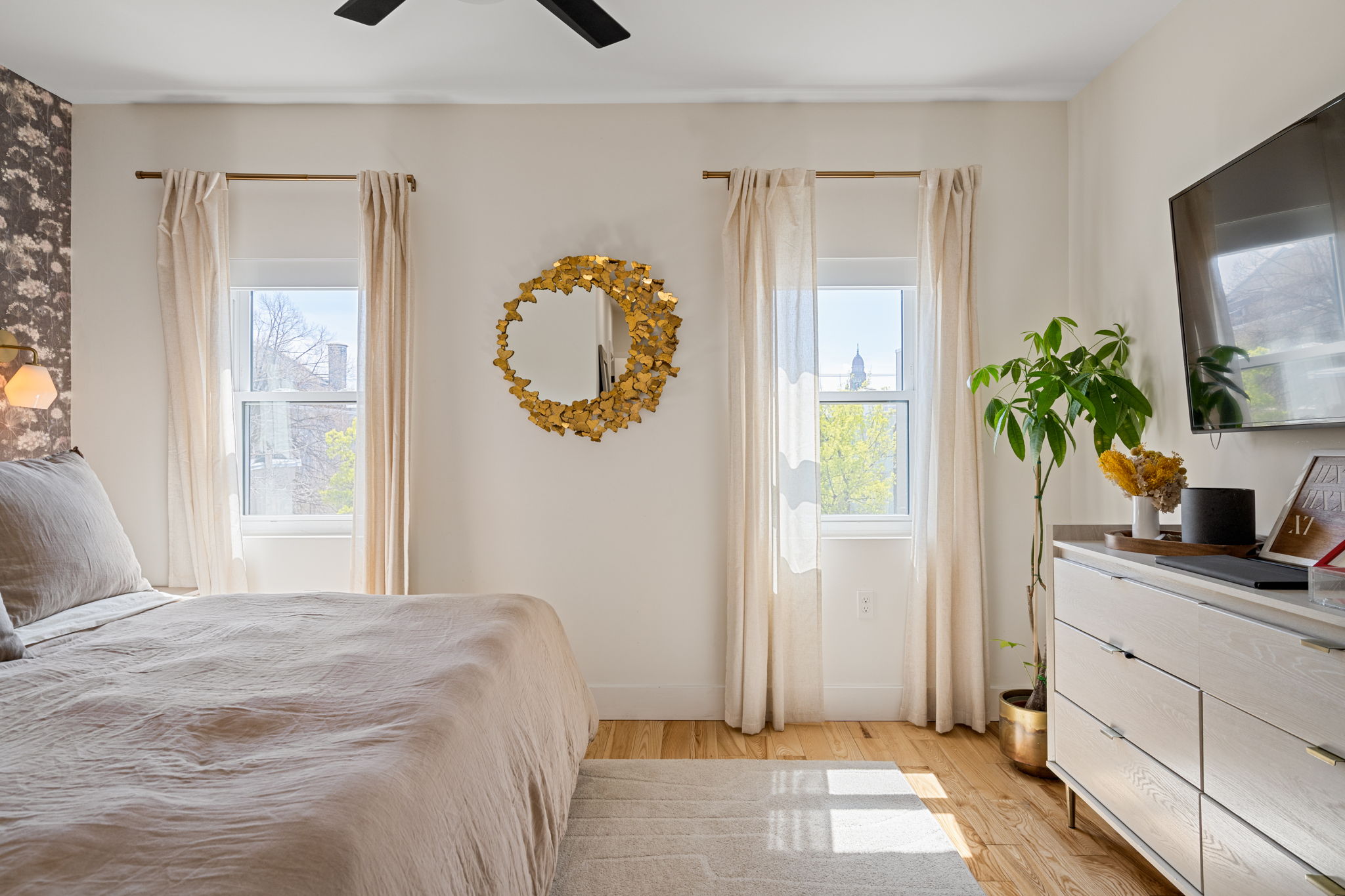 1934 Pemberton Street Philadelphia, PA 19146 - Photo 34 of 50 a bedroom with a bed and a potted plant