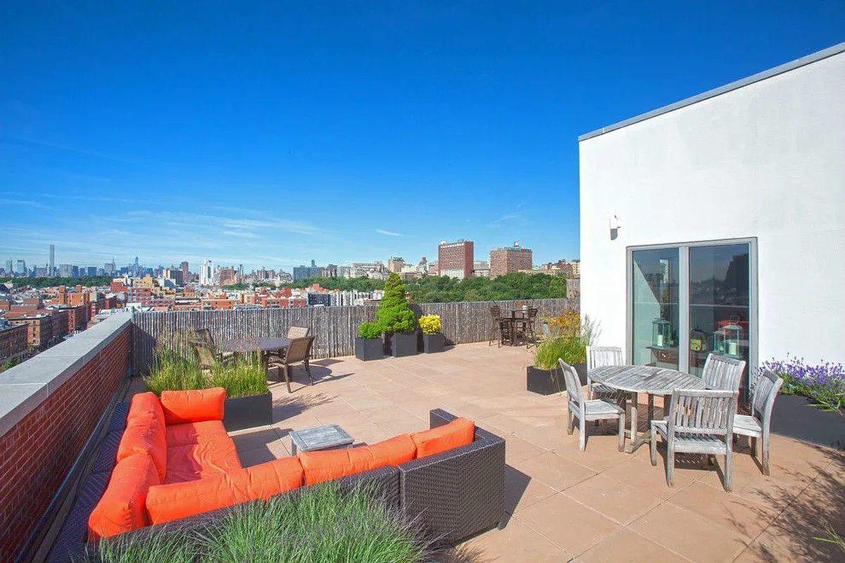 258 St Nicholas Avenue, Unit 3F Manhattan, NY 10027 - Photo 10 of 15 a view of a terrace with furniture and a table