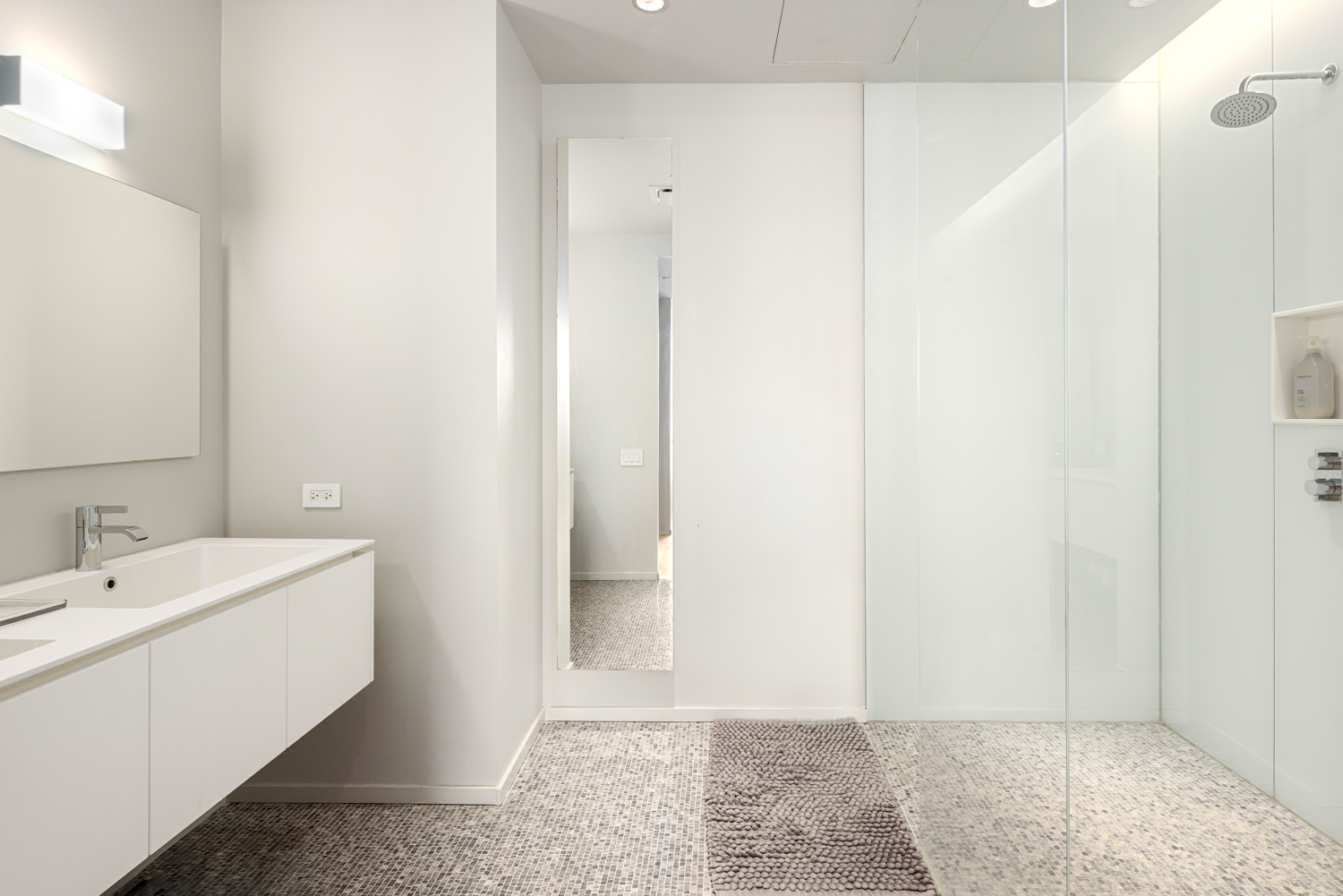 1 John Street, Unit 3C Brooklyn, NY 11201 - Photo 7 of 16 a view of a bathroom with a sink and mirror