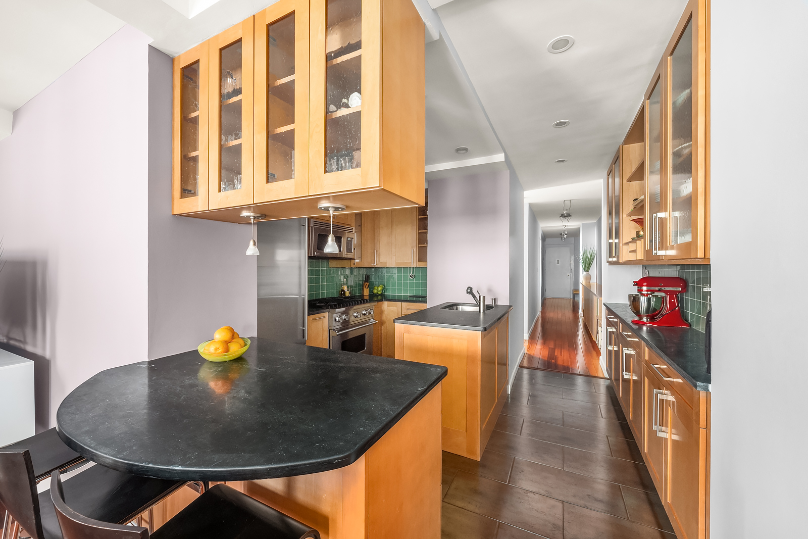 2166 Broadway, Unit 5D Manhattan, NY 10024 - Photo 3 of 11 a dining room with furniture and a kitchen view