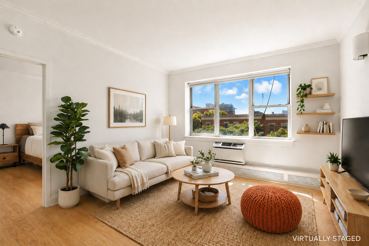 1787 Madison Avenue, Unit 402 Manhattan, NY 10035 - Photo 2 of 13 a living room with furniture potted plant and a window