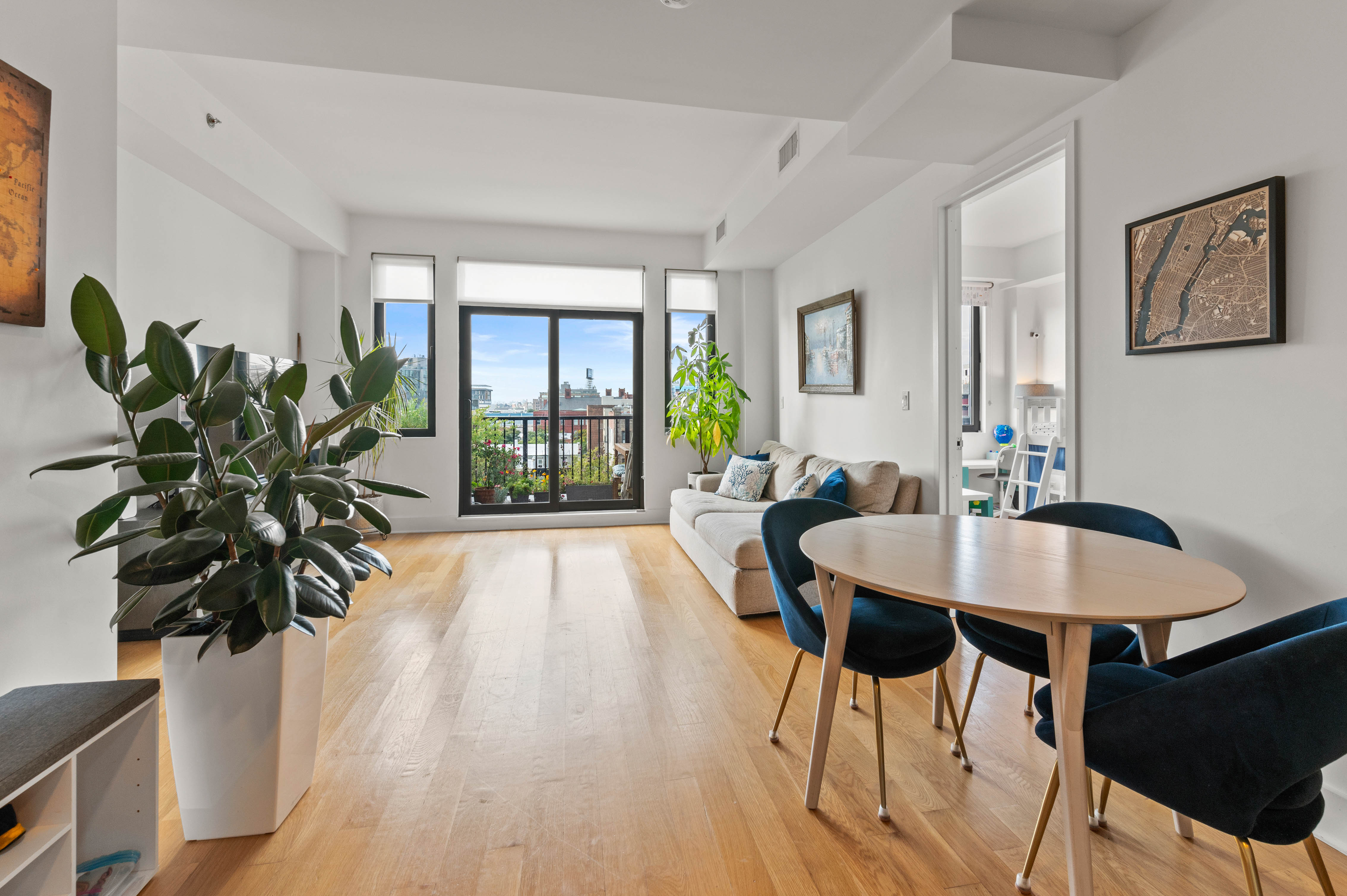 21-10 44th Drive, Unit 6C Queens, NY 11101 - Photo 1 of 17 a view of a dining room with furniture and window