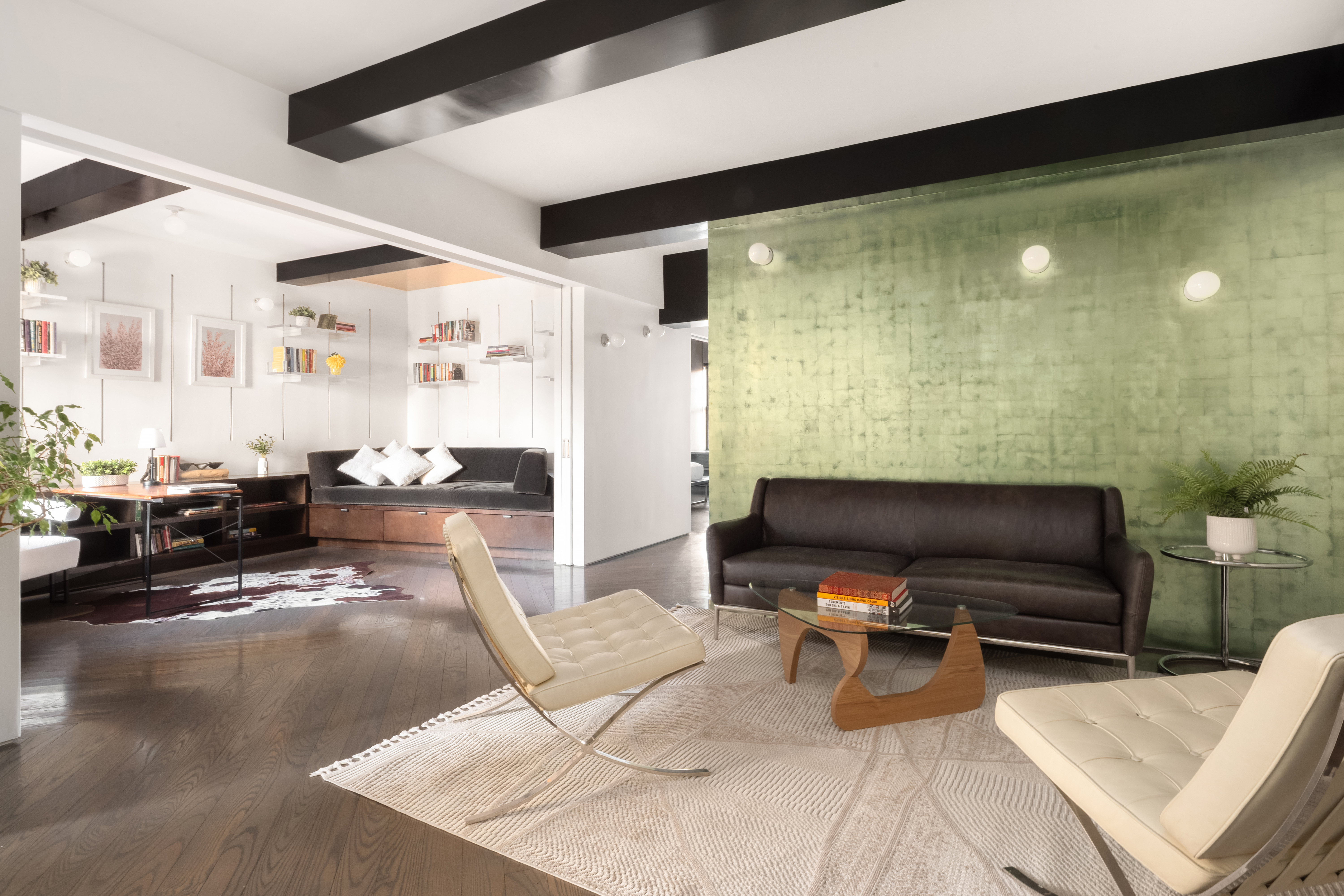 170 2nd Avenue, Unit 5A Manhattan, NY 10003 - Photo 3 of 15 a living room with furniture and a flat screen tv