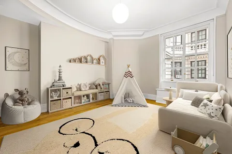 a living room with furniture and window