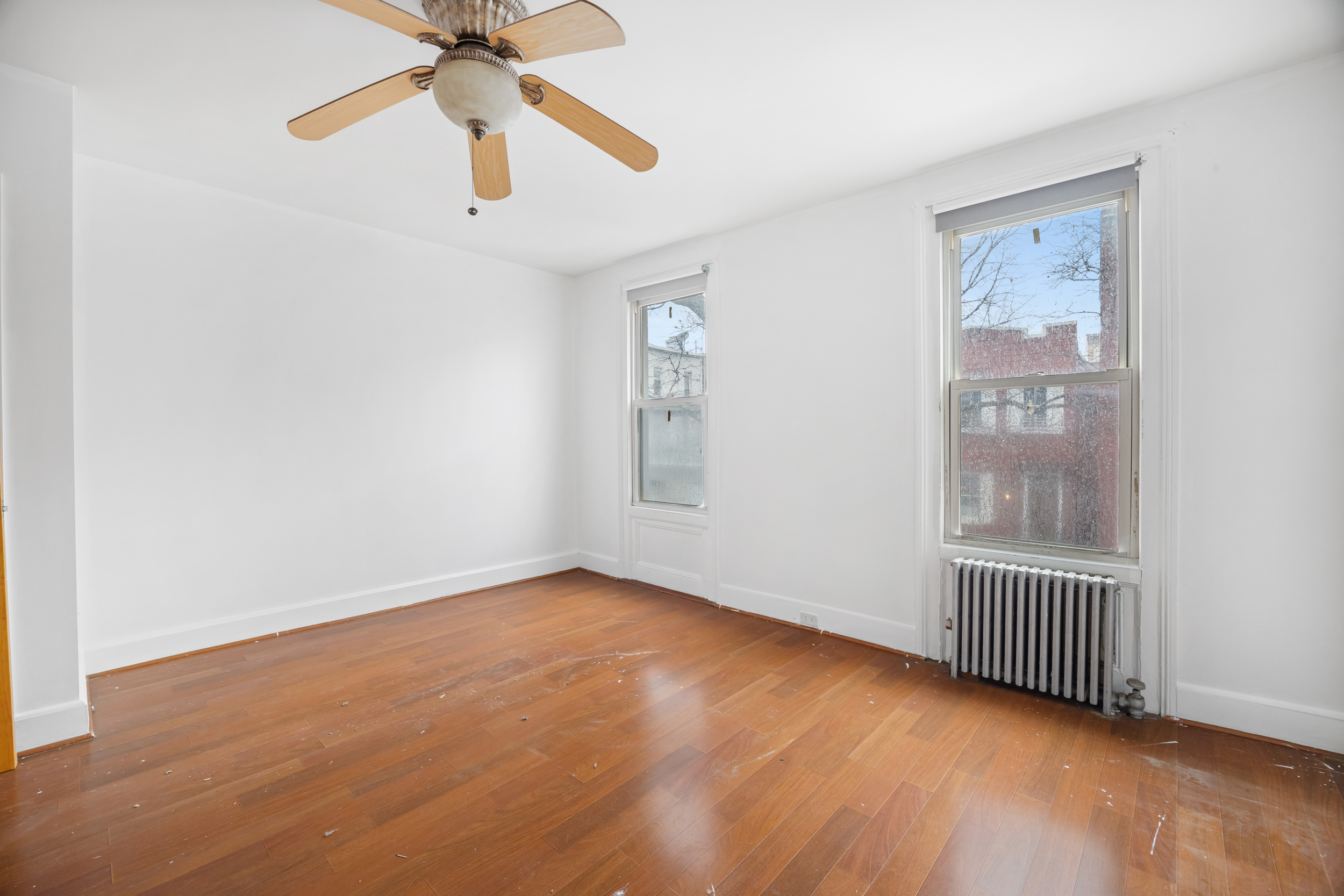 961 Lorimer Street, Unit 2 Brooklyn, NY 11222 - Photo 1 of 5 a view of an empty room with a window