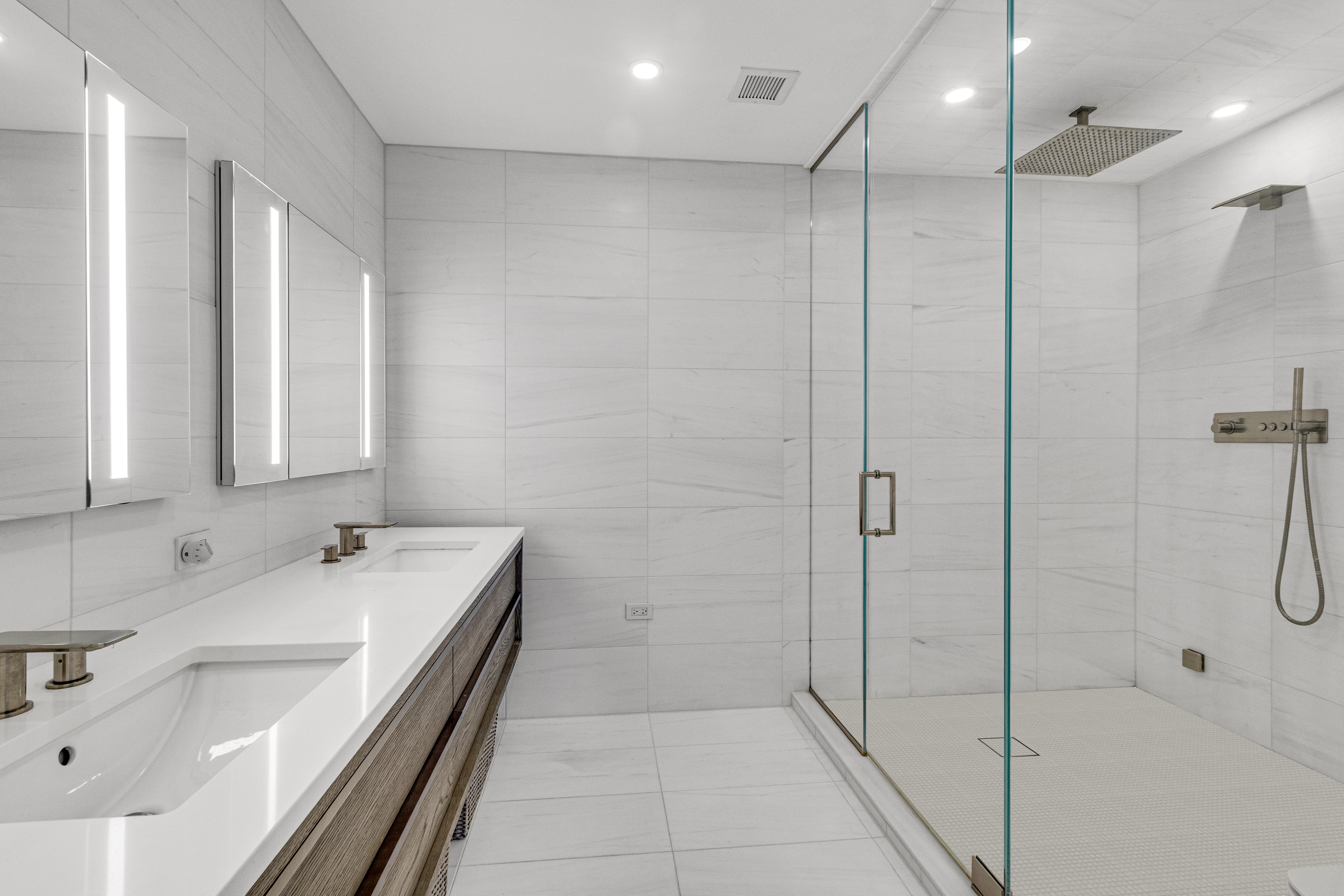 1485 5th Avenue, Unit 24F Manhattan, NY 10035 - Photo 8 of 16 a bathroom with a bathtub and a sink