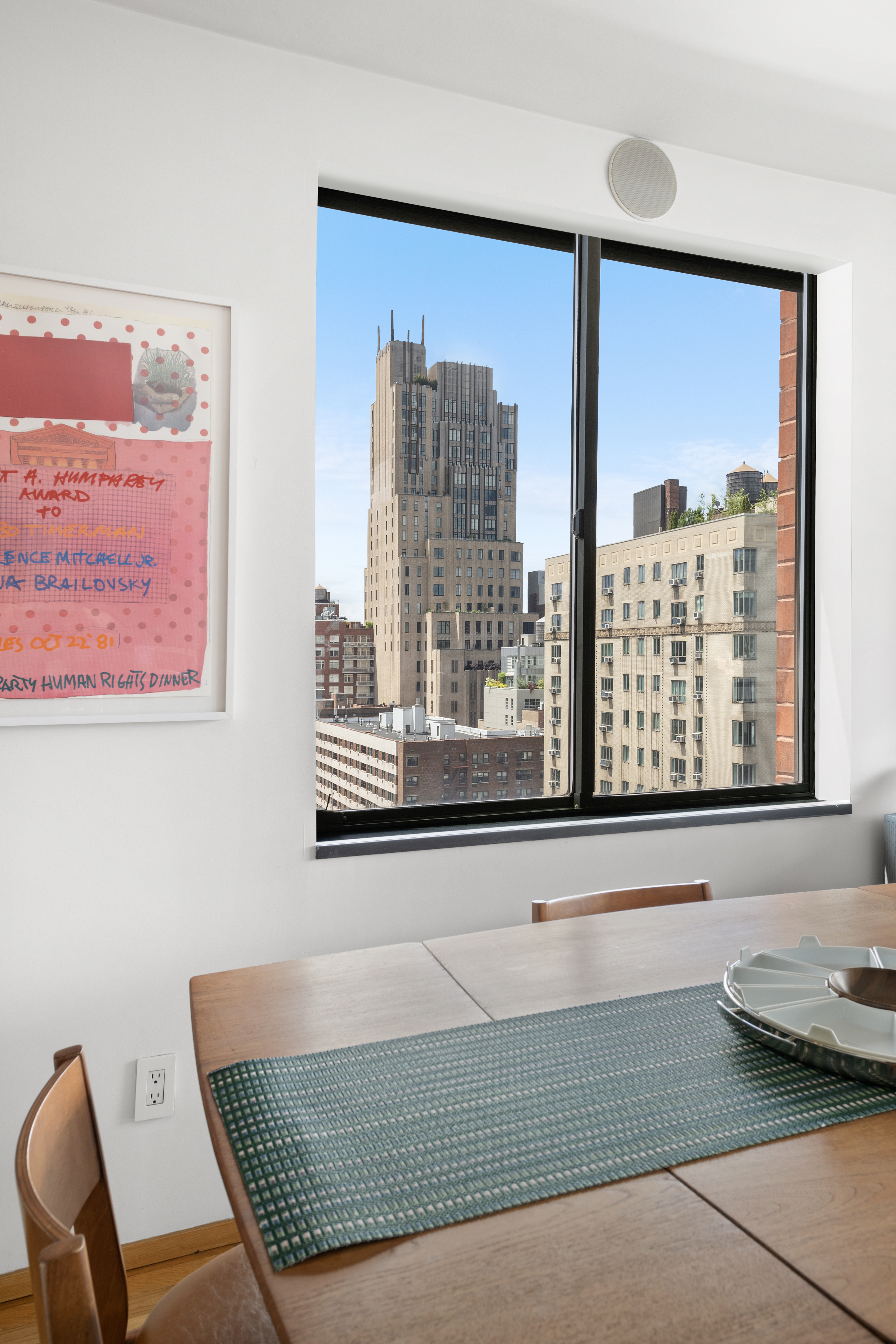 181 7th Avenue, Unit 11A Manhattan, NY 10011 - Photo 3 of 13 a view of a living room and a window