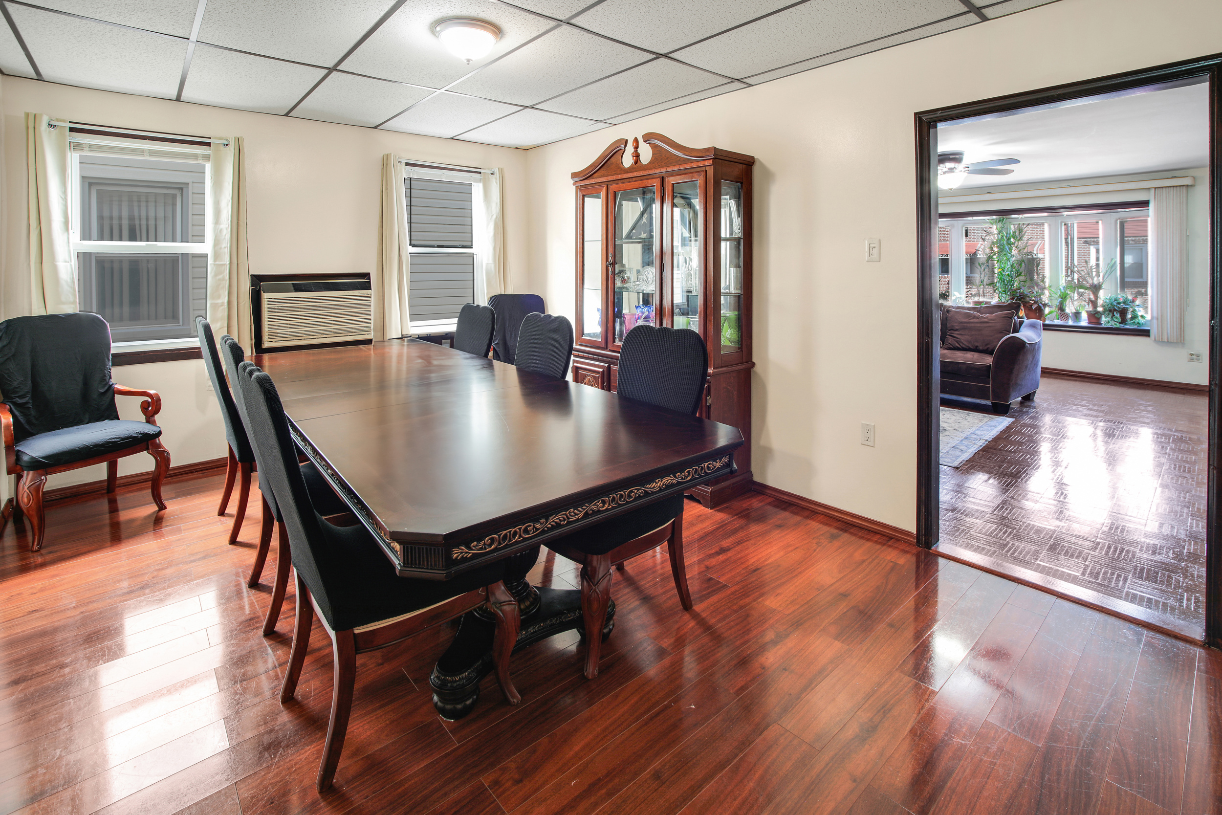 1532 Kimball Street Brooklyn, NY 11234 - Photo 4 of 13 a view of a dining room with furniture window and wooden floor