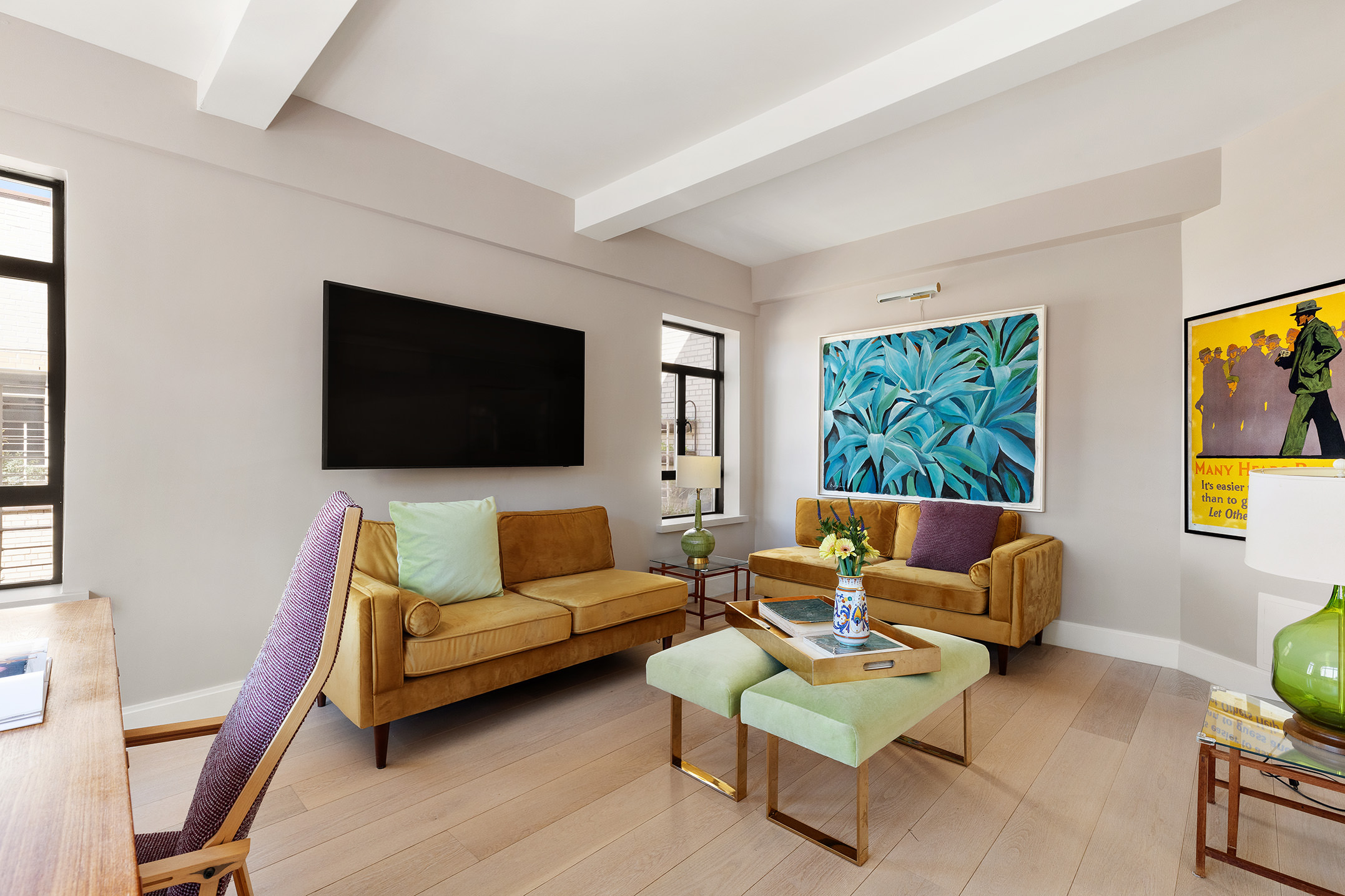 15 West 84th Street, Unit PHB Manhattan, NY 10024 - Photo 10 of 15 a living room with furniture and a flat screen tv