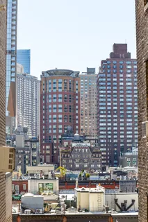 a view of a city with tall buildings