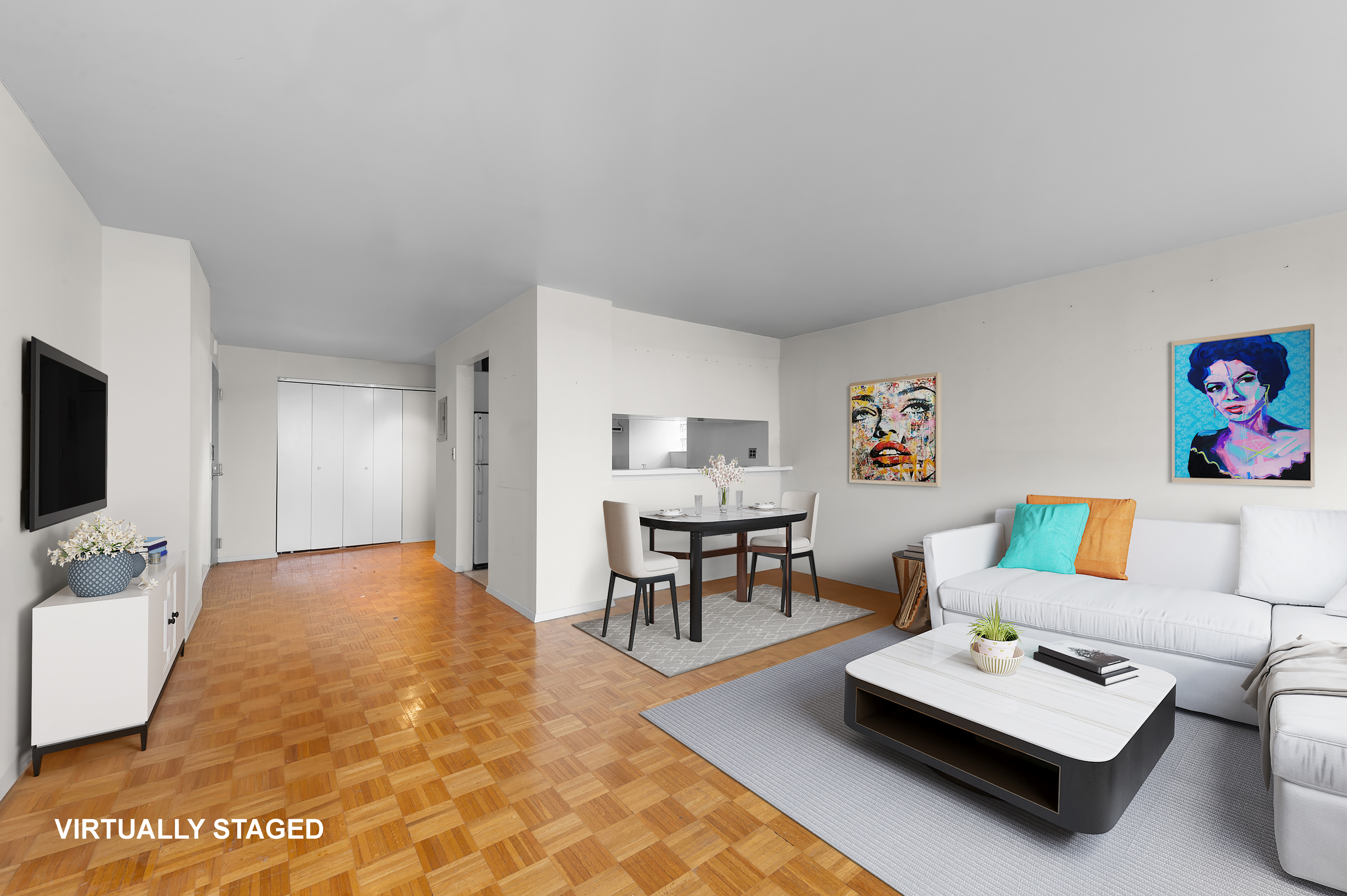 376 Broadway, Unit 24G Manhattan, NY 10013 - Photo 2 of 8 a living room with furniture and a flat screen tv