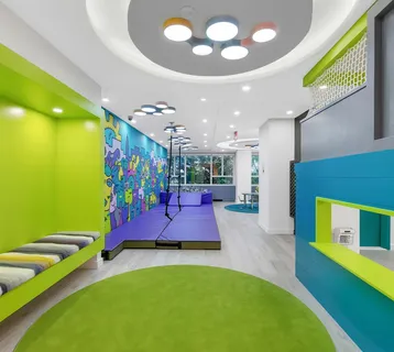 a black and white photo of a living room