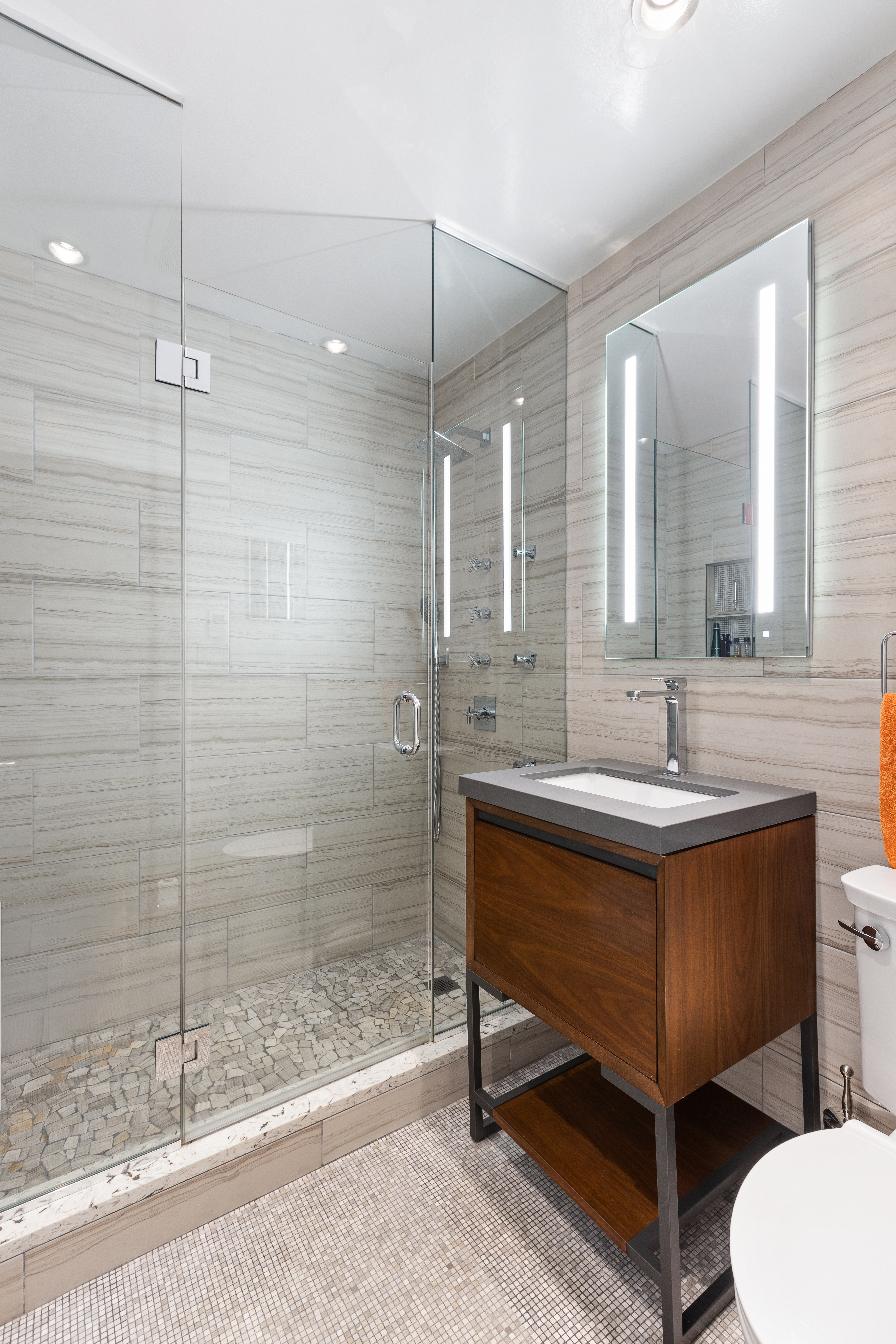 203 East 7th Street, Unit 2 Manhattan, NY 10009 - Photo 8 of 9 a bathroom with a sink and a mirror