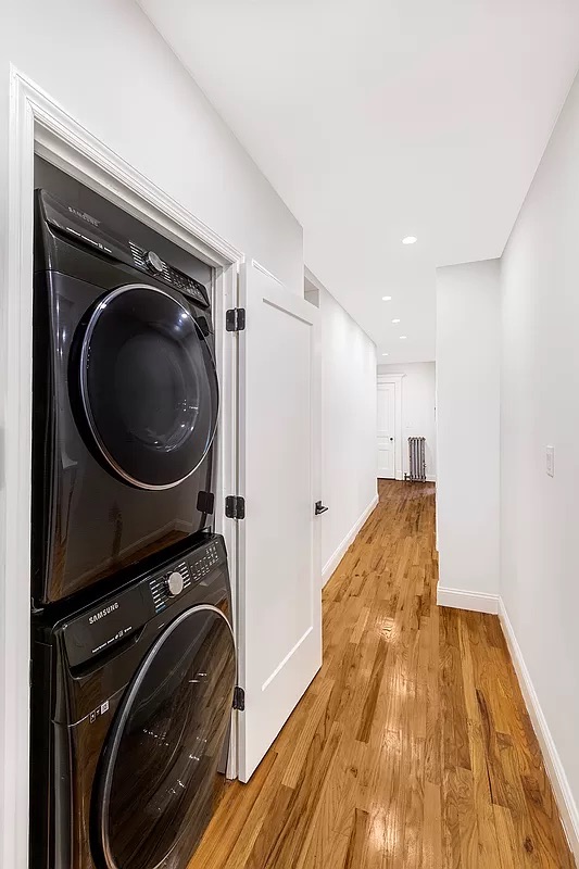 1097 Park Place, Unit 1 Brooklyn, NY 11213 - Photo 6 of 9 a view of a hallway with washer and dryer