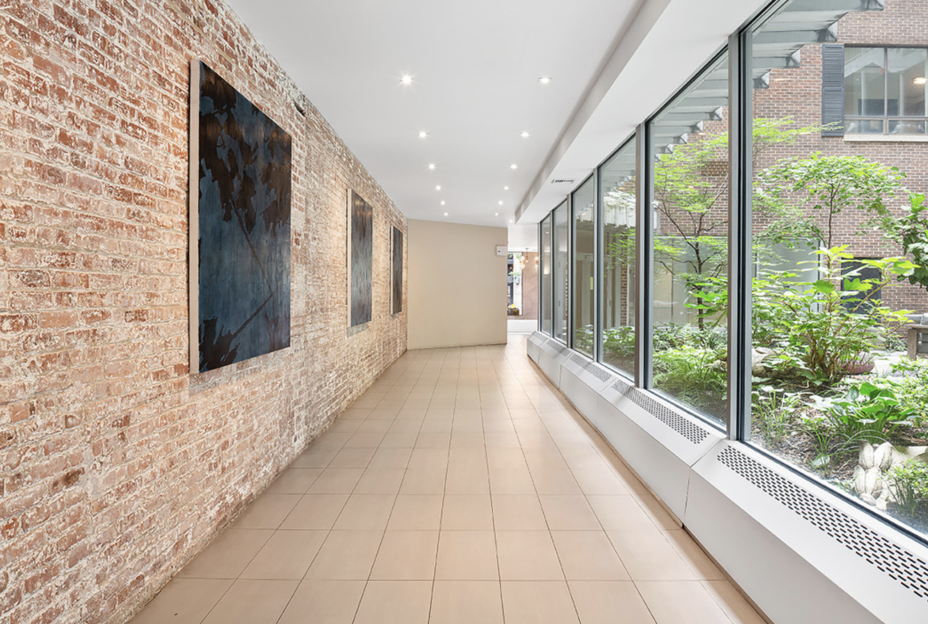 250 Mercer Street, Unit C302 Manhattan, NY 10012 - Photo 19 of 24 a view of a building from the hallway
