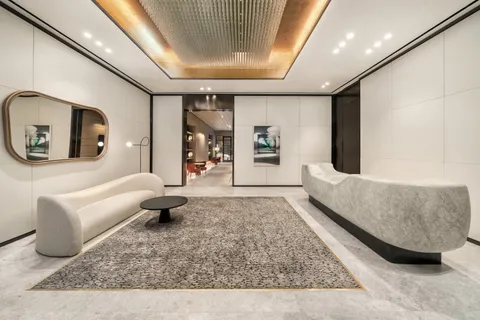 a view of a kitchen with a large window